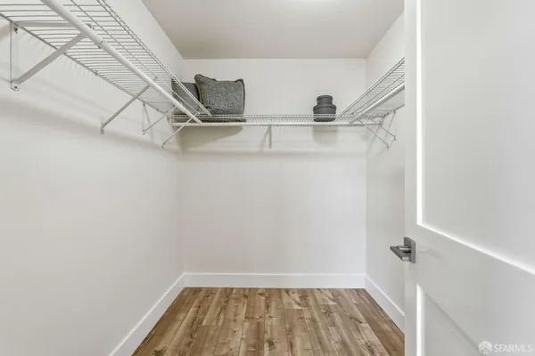 a view of a room with racks on the wall