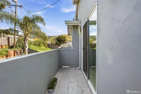 a view of a house with a patio