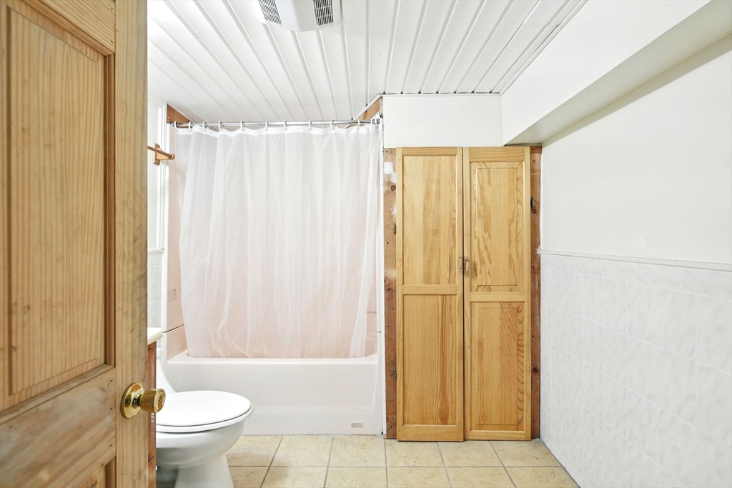 224 Cambria Street Springfield, MA 01118 - Photo 17 of 23 a bathroom with a sink toilet and shower