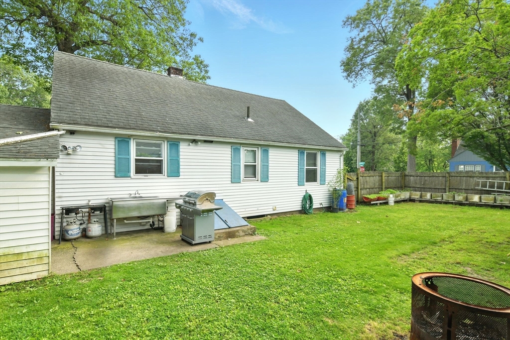 224 Cambria Street Springfield, MA 01118 - Photo 21 of 23 a view of a house with a backyard