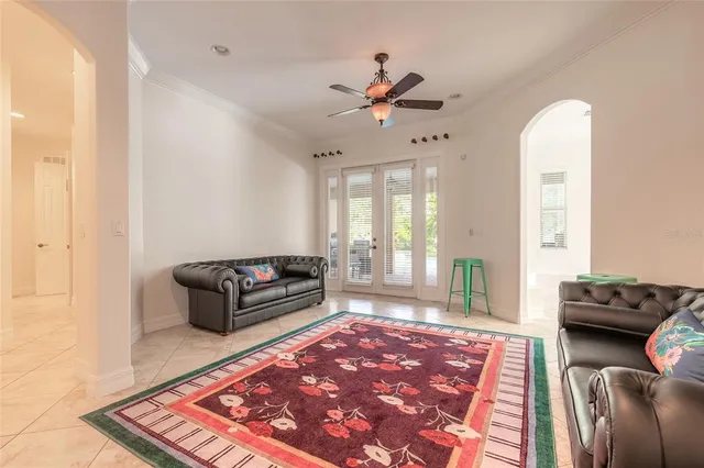 a bedroom with furniture and wooden floor