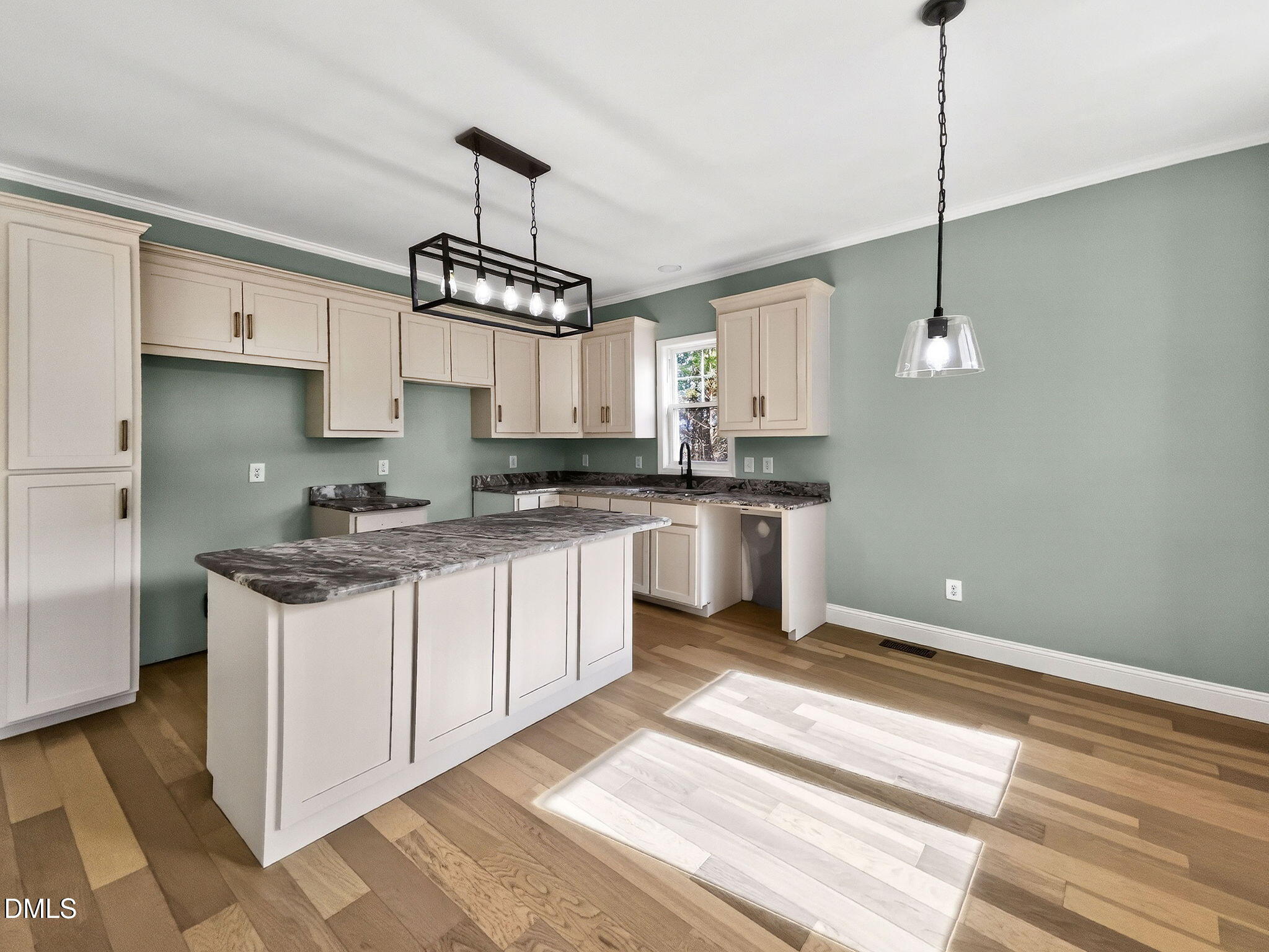 81 Pond View Court Rocky Mount, NC 27801 - Photo 13 of 28 a kitchen with stainless steel appliances granite countertop a sink a stove a refrigerator and island with wooden floor