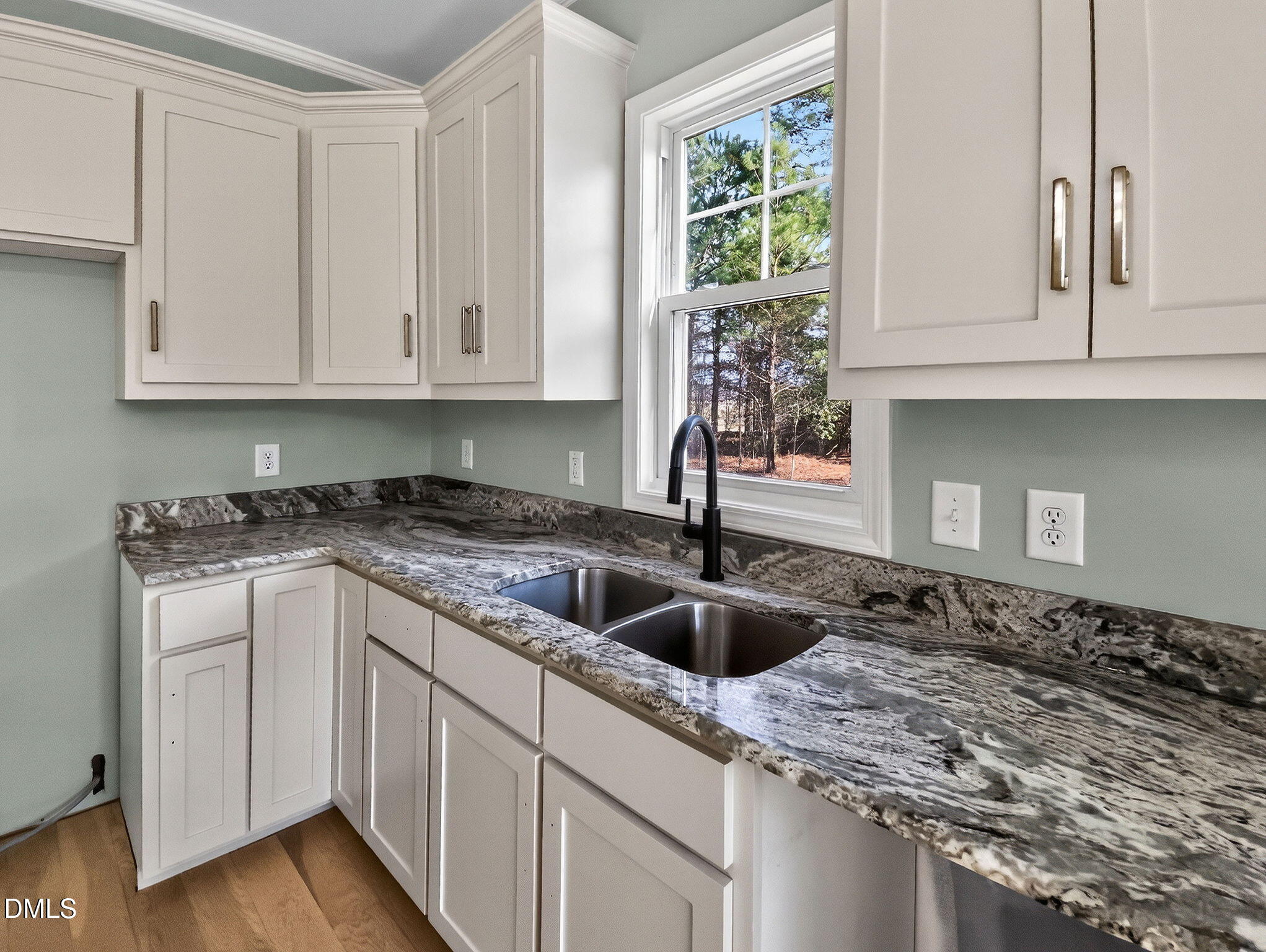 81 Pond View Court Rocky Mount, NC 27801 - Photo 16 of 28 a kitchen with granite countertop a sink and white cabinets