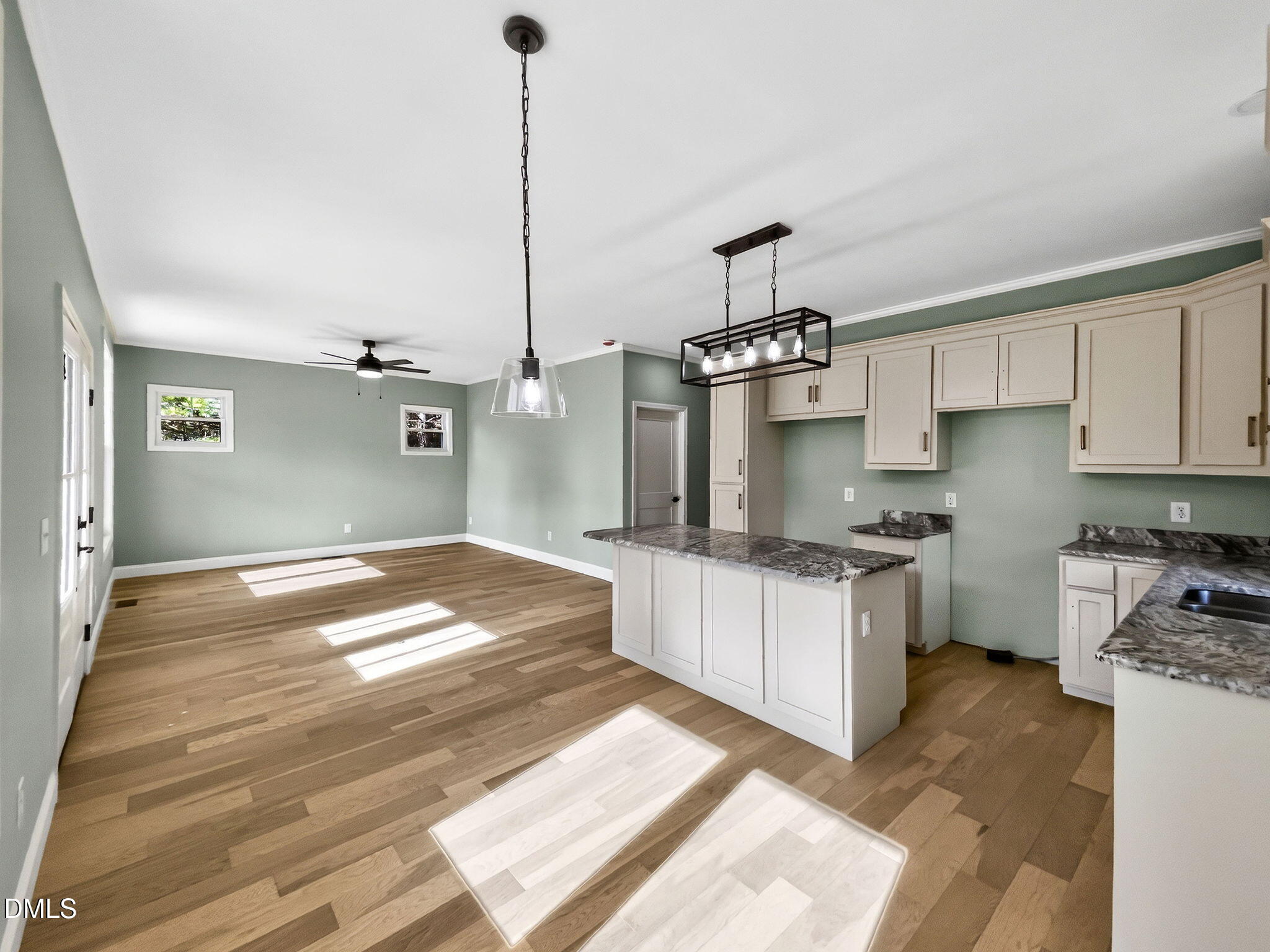 81 Pond View Court Rocky Mount, NC 27801 - Photo 20 of 28 a kitchen with granite countertop a sink stove and refrigerator