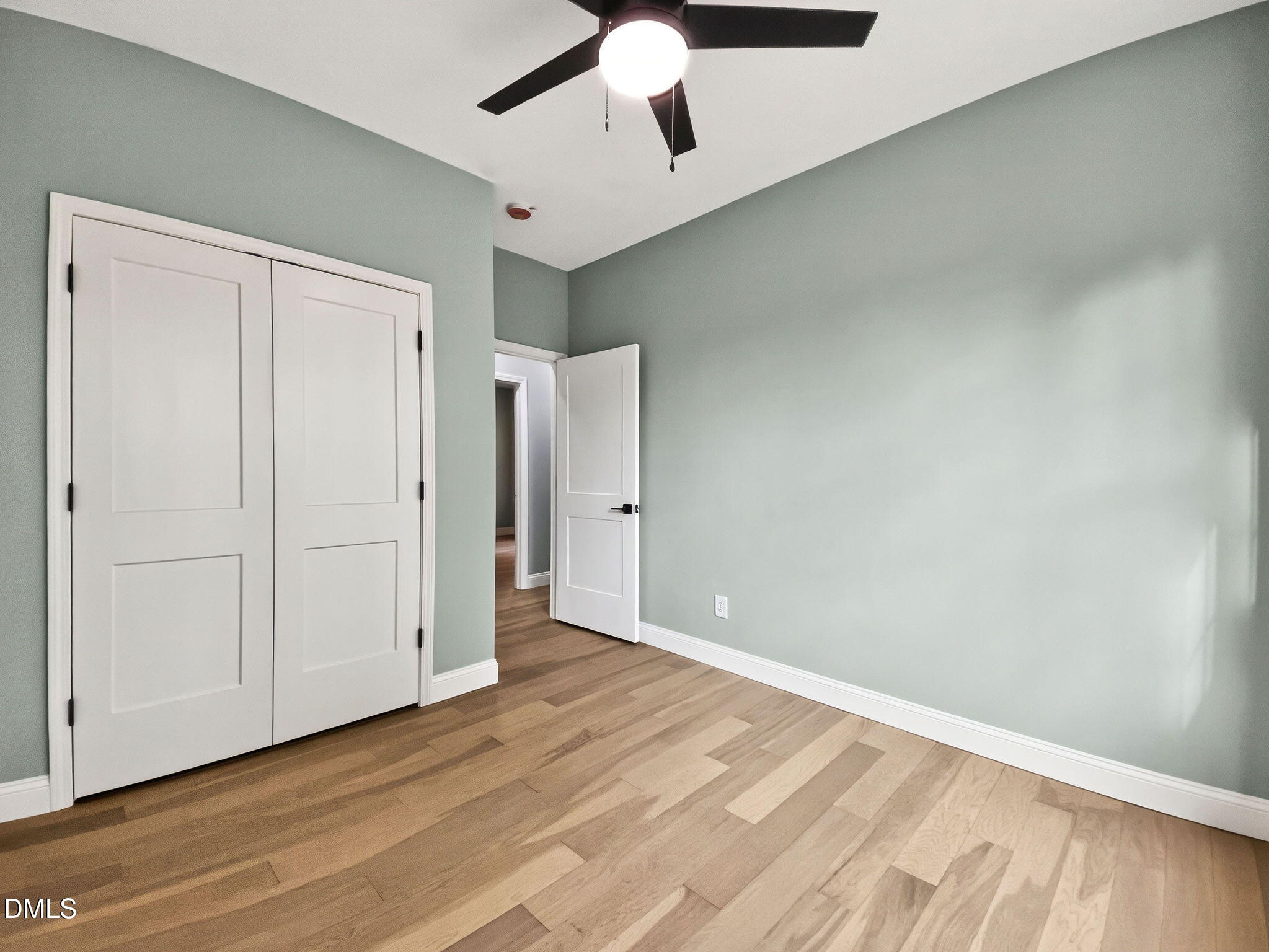 81 Pond View Court Rocky Mount, NC 27801 - Photo 25 of 28 a view of an empty room with wooden floor