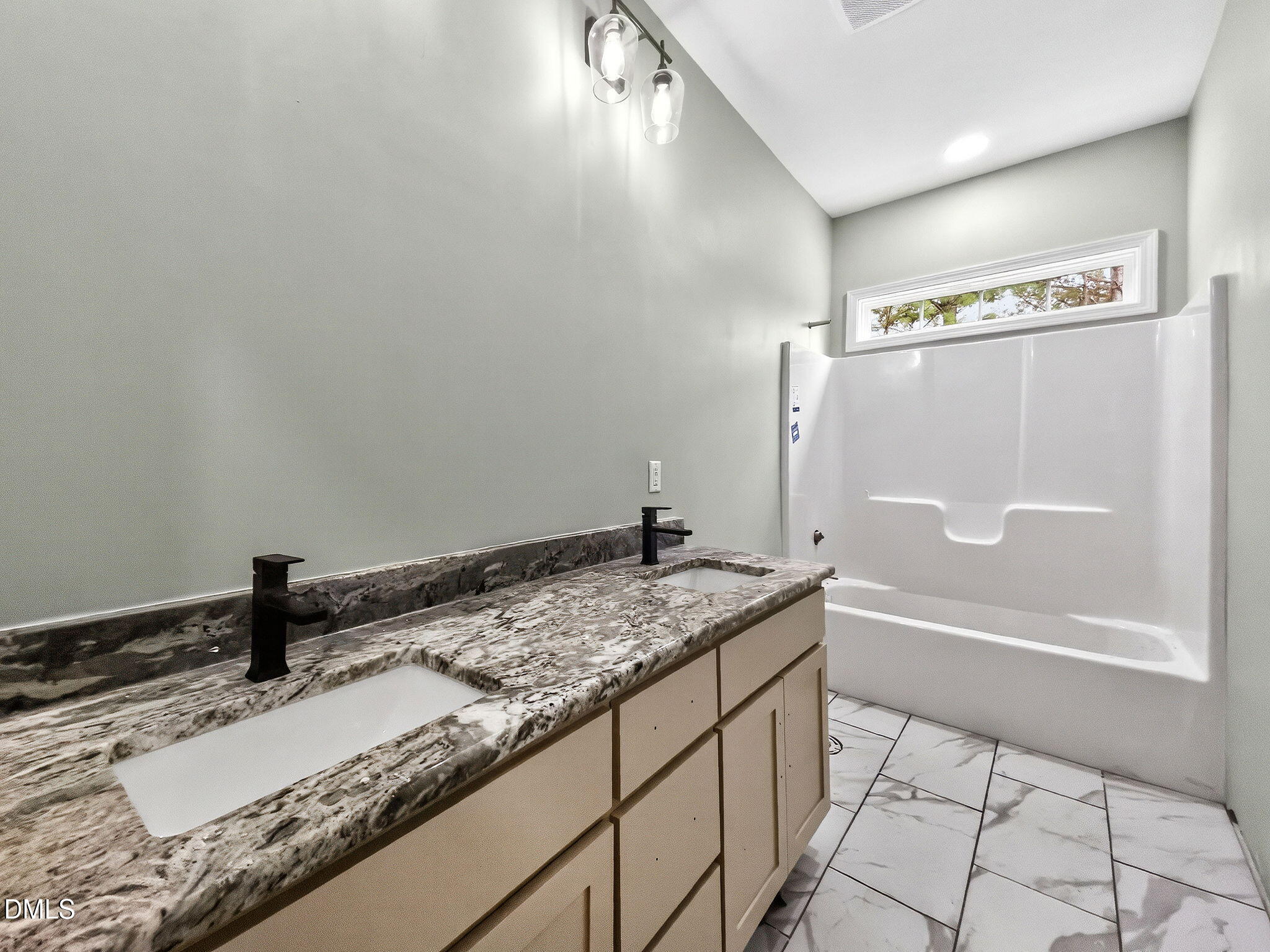 81 Pond View Court Rocky Mount, NC 27801 - Photo 28 of 28 a bathroom with a granite countertop sink and a bathtub