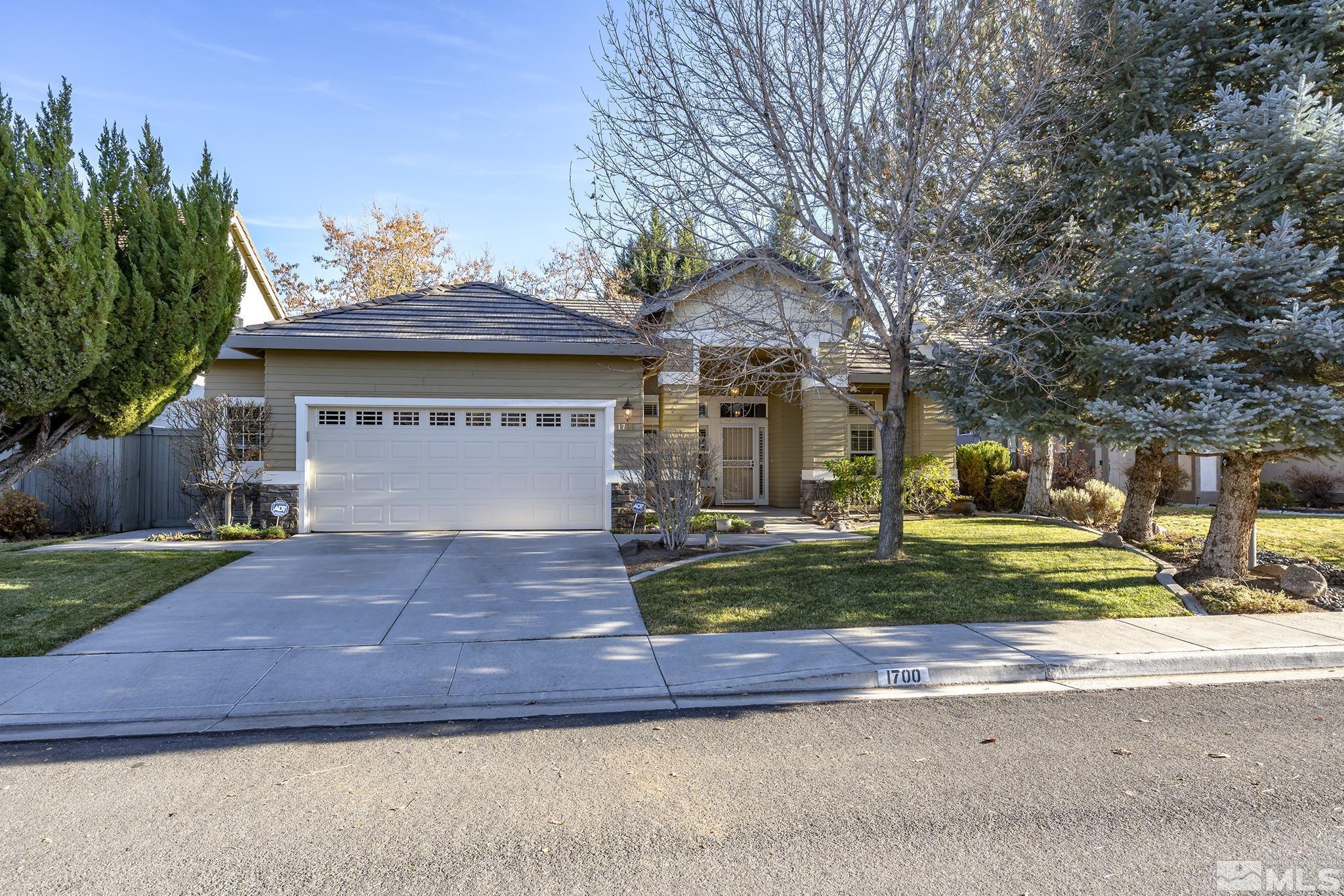 1700 Comanche Moon Drive Reno, NV 89521 - Photo 1 of 34 a front view of house with yard