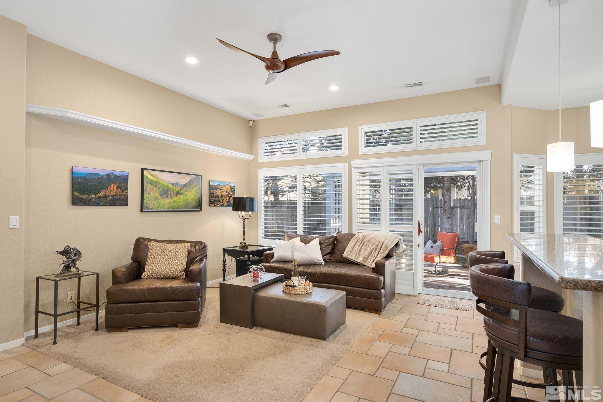 1700 Comanche Moon Drive Reno, NV 89521 - Photo 11 of 34 a living room with furniture and a large window