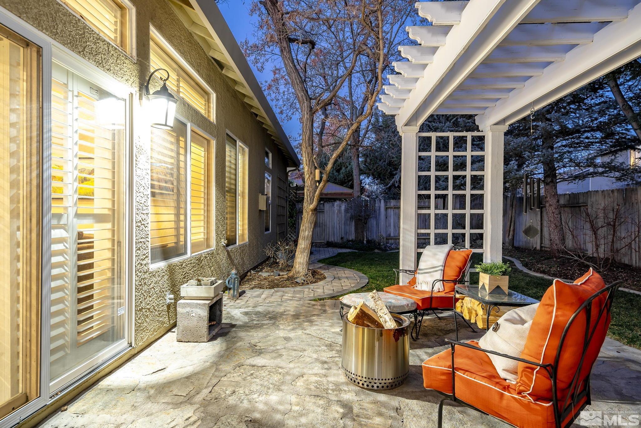 1700 Comanche Moon Drive Reno, NV 89521 - Photo 27 of 34 a backyard of a house with outdoor seating