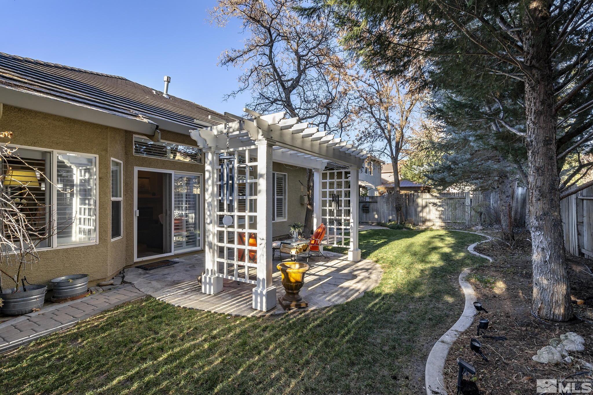 1700 Comanche Moon Drive Reno, NV 89521 - Photo 30 of 34 a view of a house with backyard and sitting area