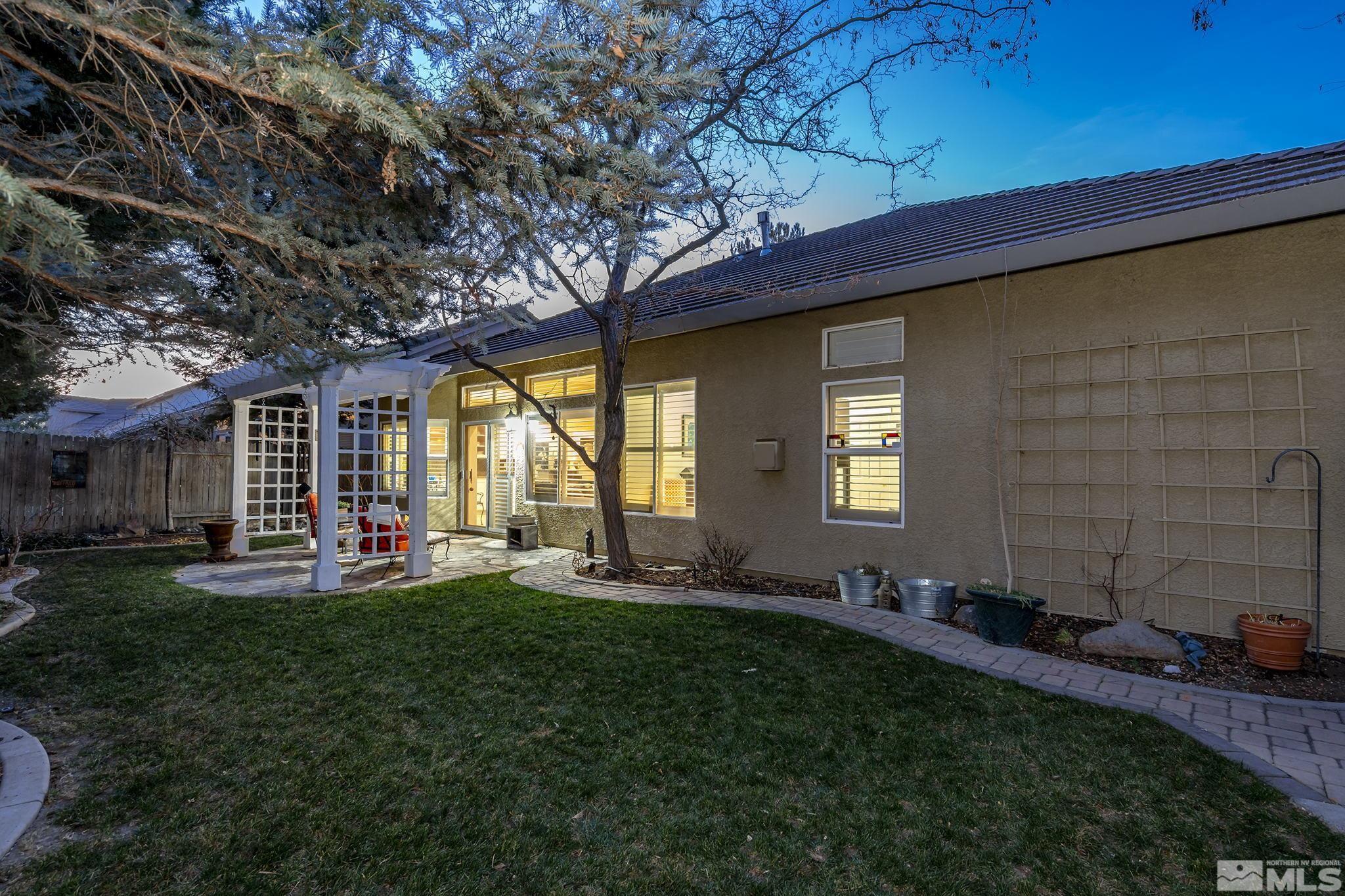 1700 Comanche Moon Drive Reno, NV 89521 - Photo 33 of 34 a front view of a house with a big yard