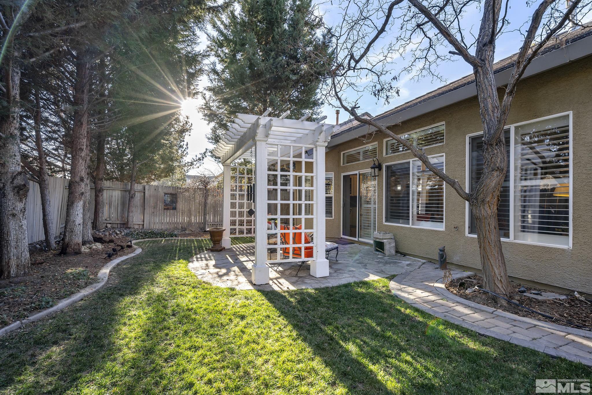 1700 Comanche Moon Drive Reno, NV 89521 - Photo 34 of 34 a view of a house with backyard and sitting area
