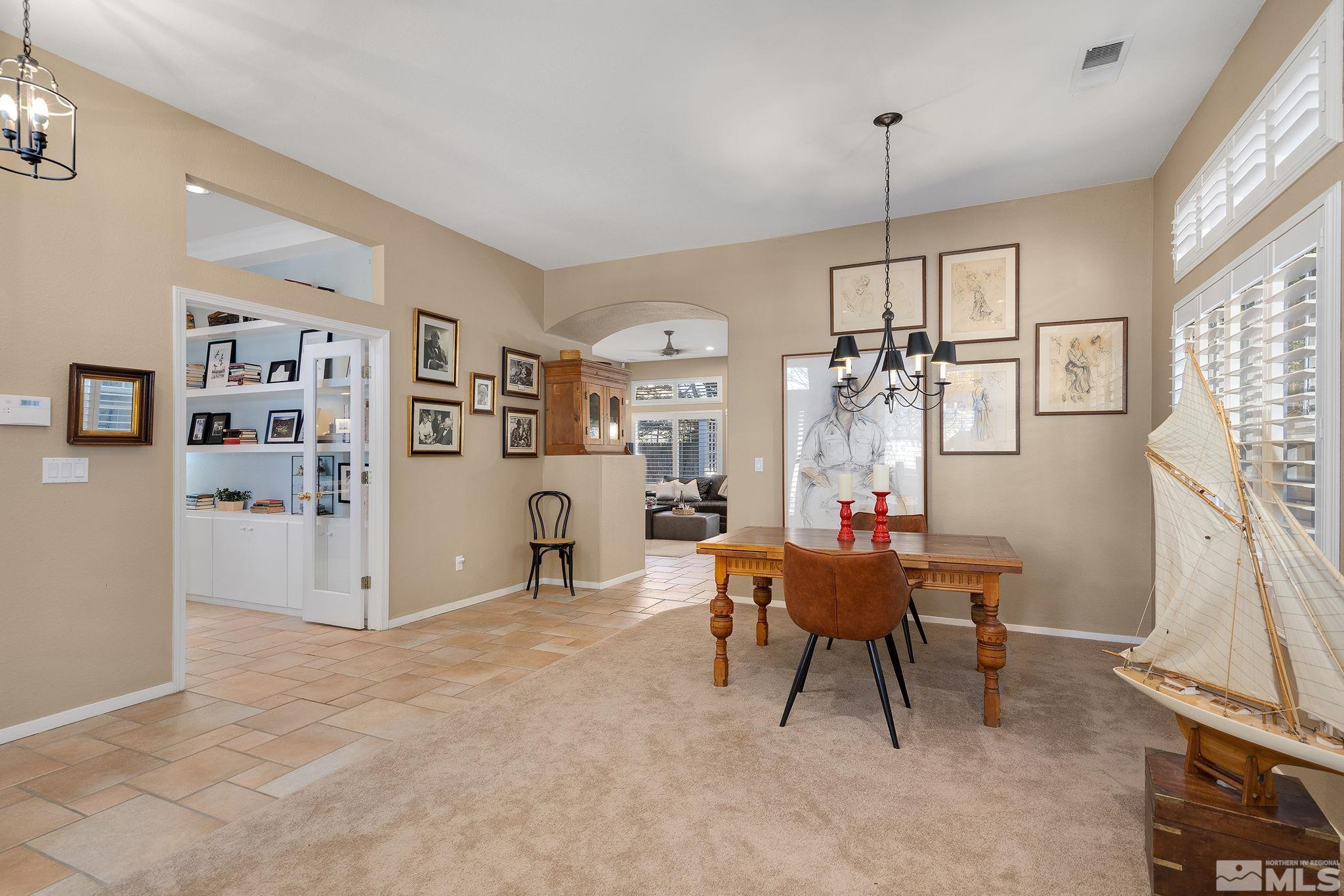 1700 Comanche Moon Drive Reno, NV 89521 - Photo 8 of 34 a view of a livingroom with furniture window and wooden floor