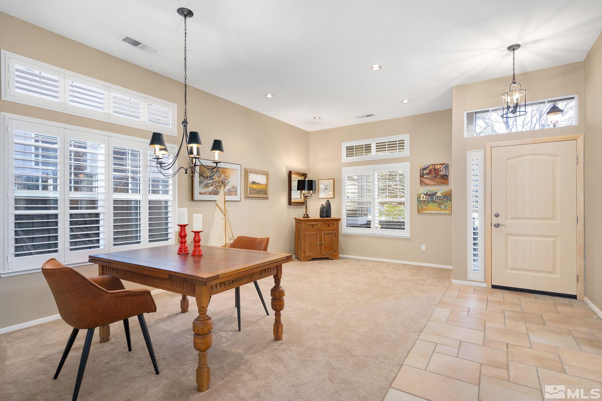 1700 Comanche Moon Drive Reno, NV 89521 - Photo 9 of 34 a view of a dining room with furniture and window