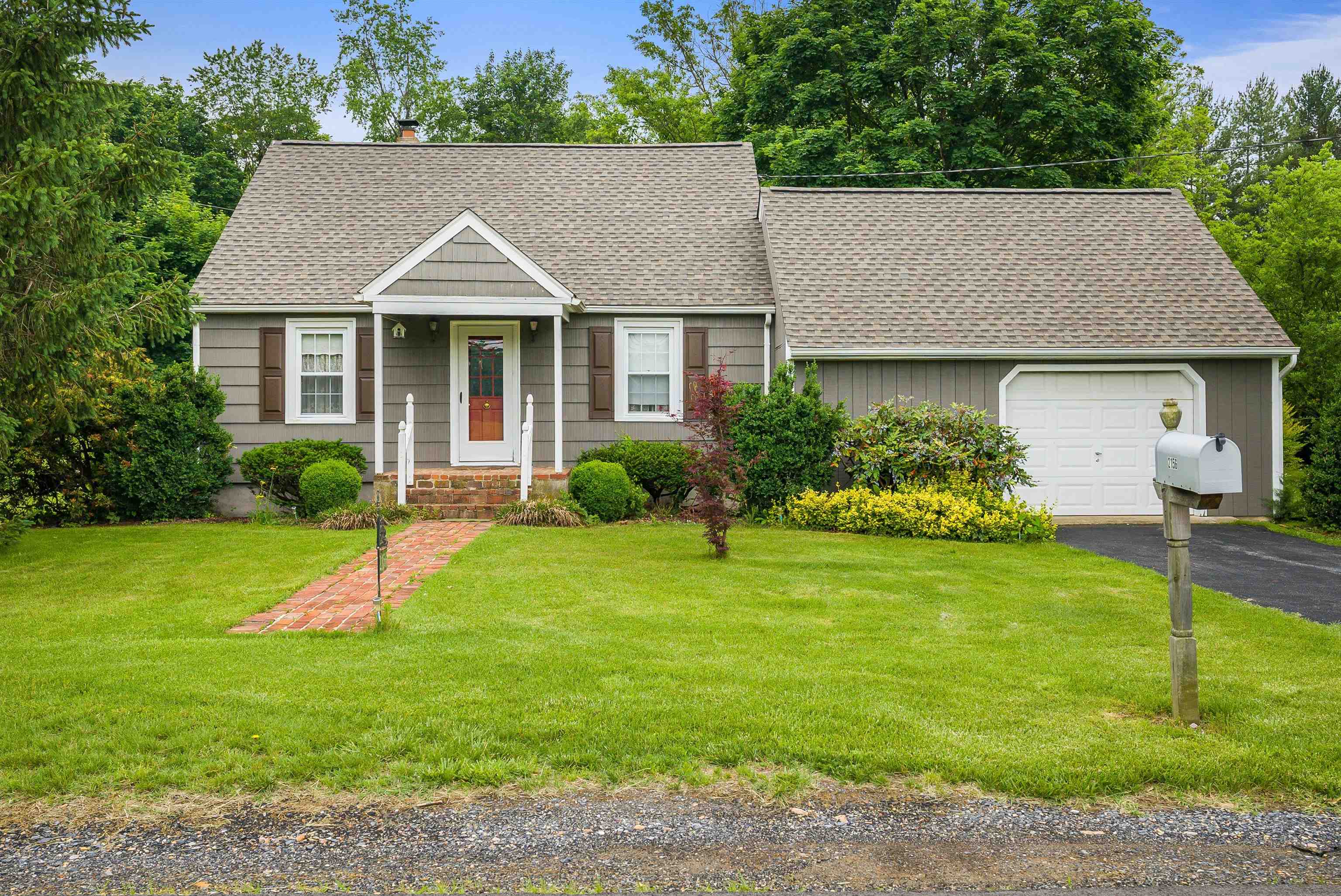 2156 Lyndhurst Road Waynesboro, VA 22980 - Photo 1 of 35 a view of a house with a garden and plants
