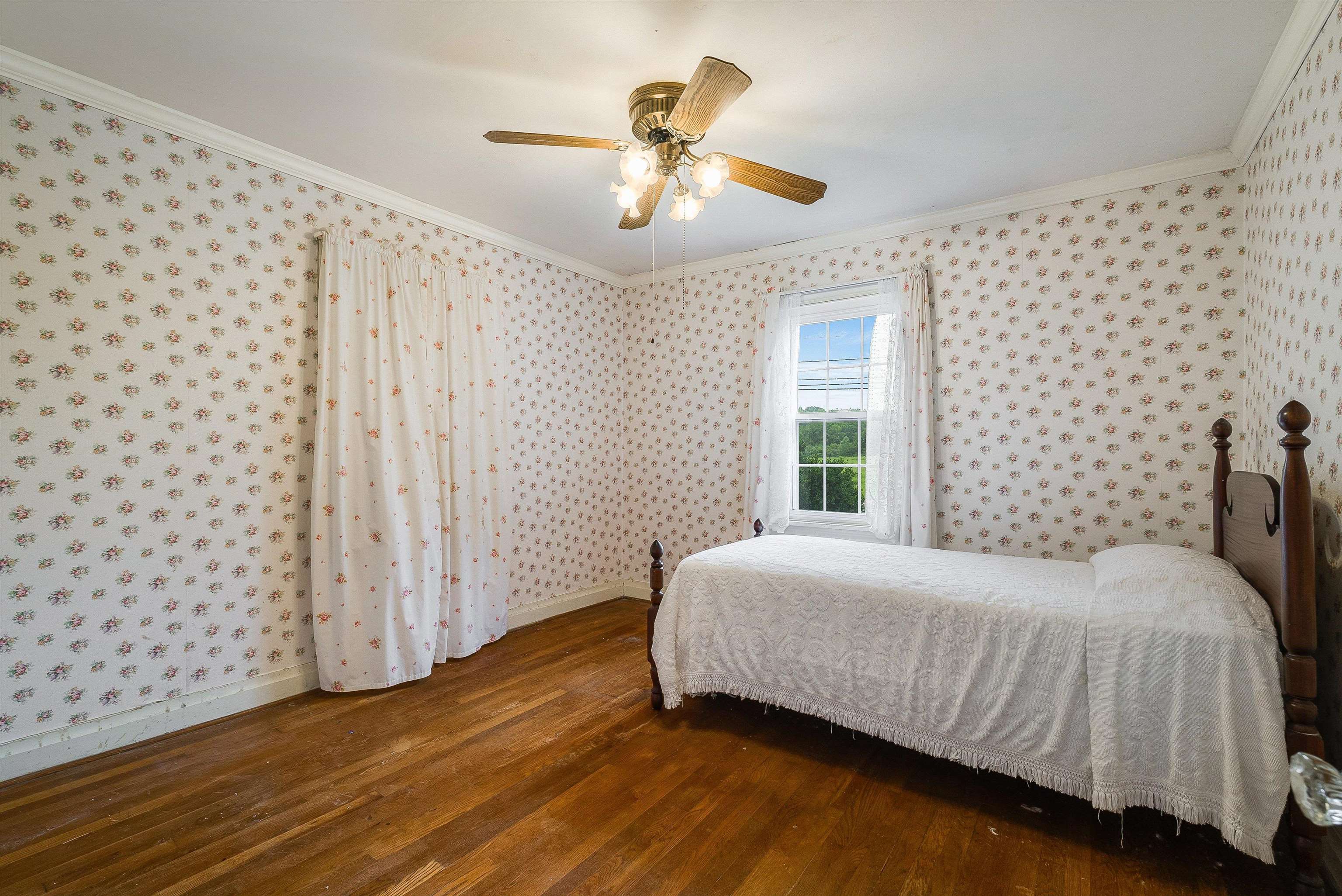 2156 Lyndhurst Road Waynesboro, VA 22980 - Photo 13 of 35 a bedroom with a bed and a window