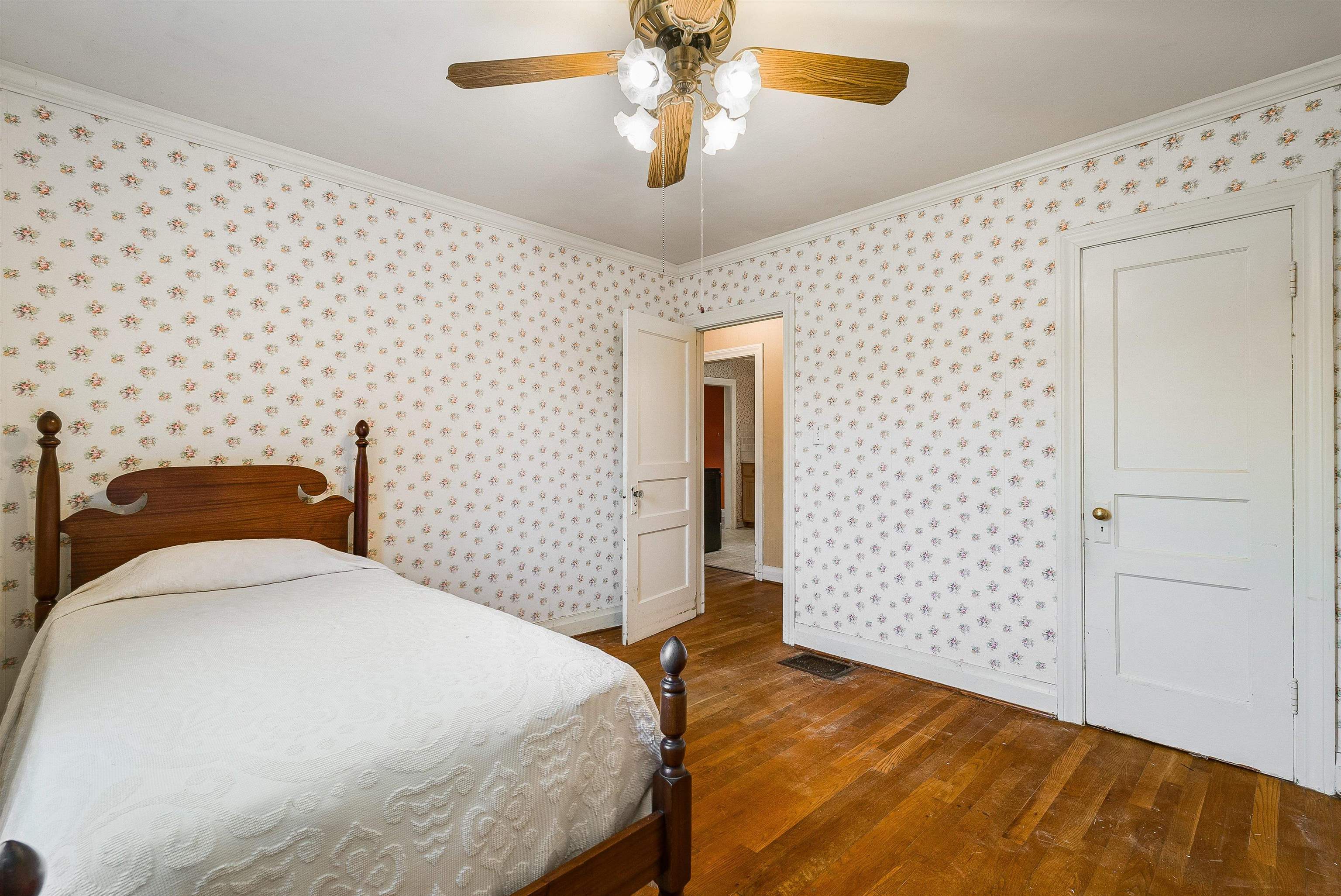 2156 Lyndhurst Road Waynesboro, VA 22980 - Photo 14 of 35 a bedroom with a bed and a chandelier
