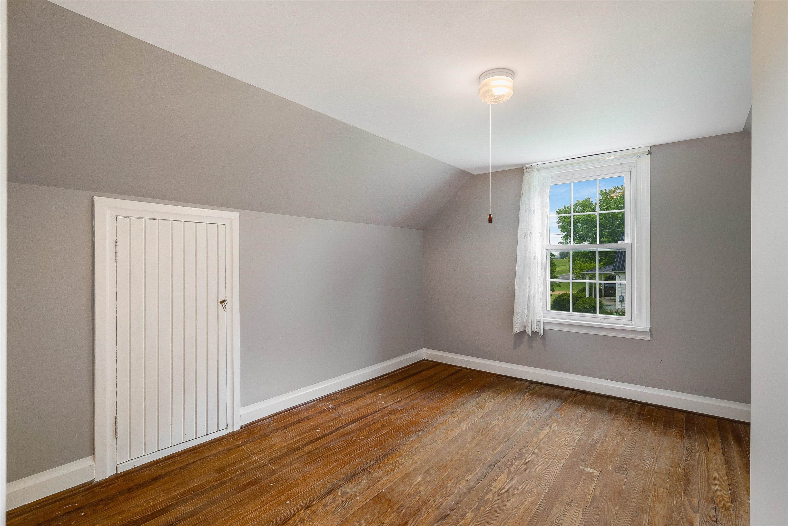 2156 Lyndhurst Road Waynesboro, VA 22980 - Photo 17 of 35 an empty room with wooden floor and windows