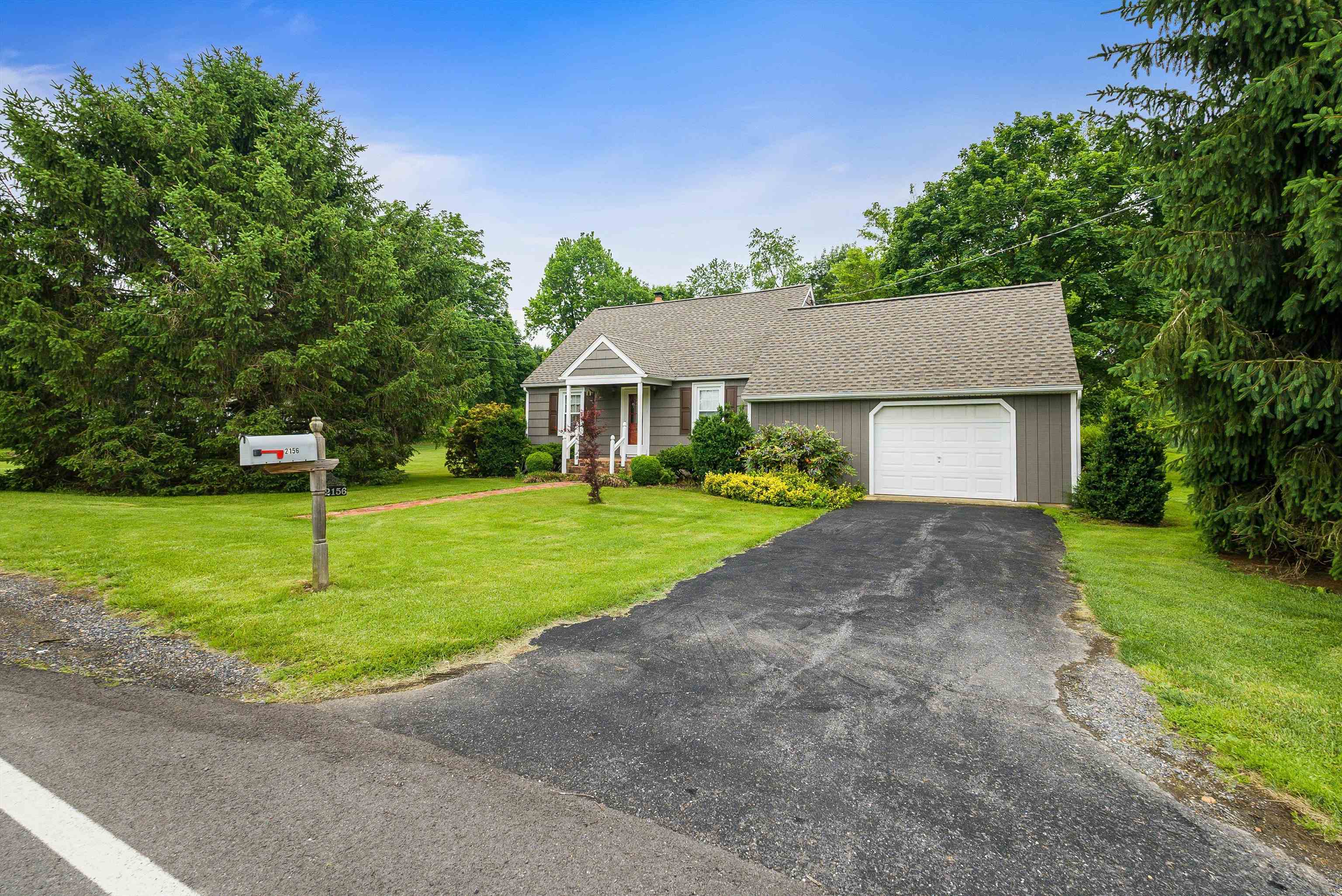 2156 Lyndhurst Road Waynesboro, VA 22980 - Photo 2 of 35 a house that has a tree in front of it