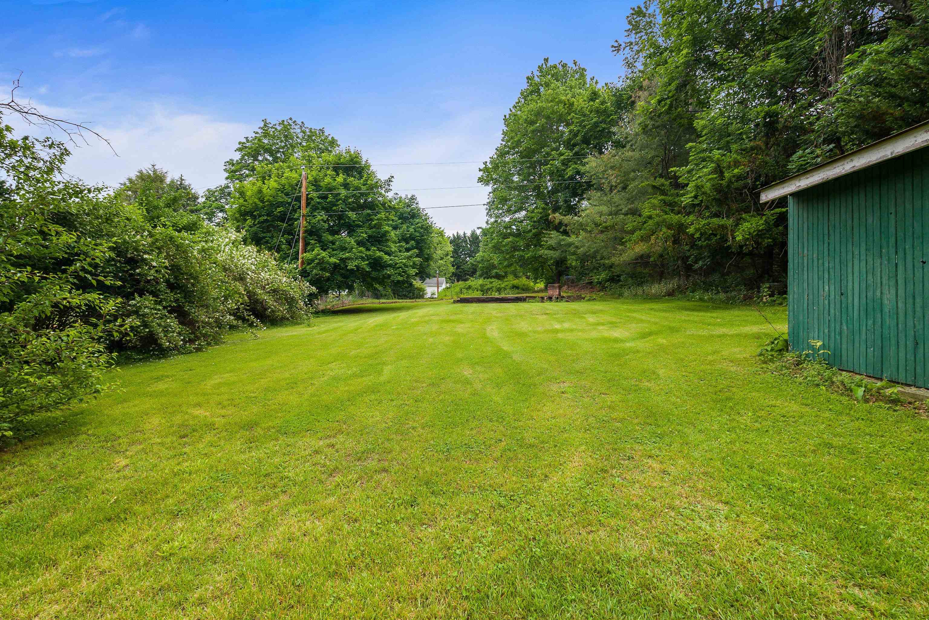 2156 Lyndhurst Road Waynesboro, VA 22980 - Photo 31 of 35 a view of a field with a trees in the background
