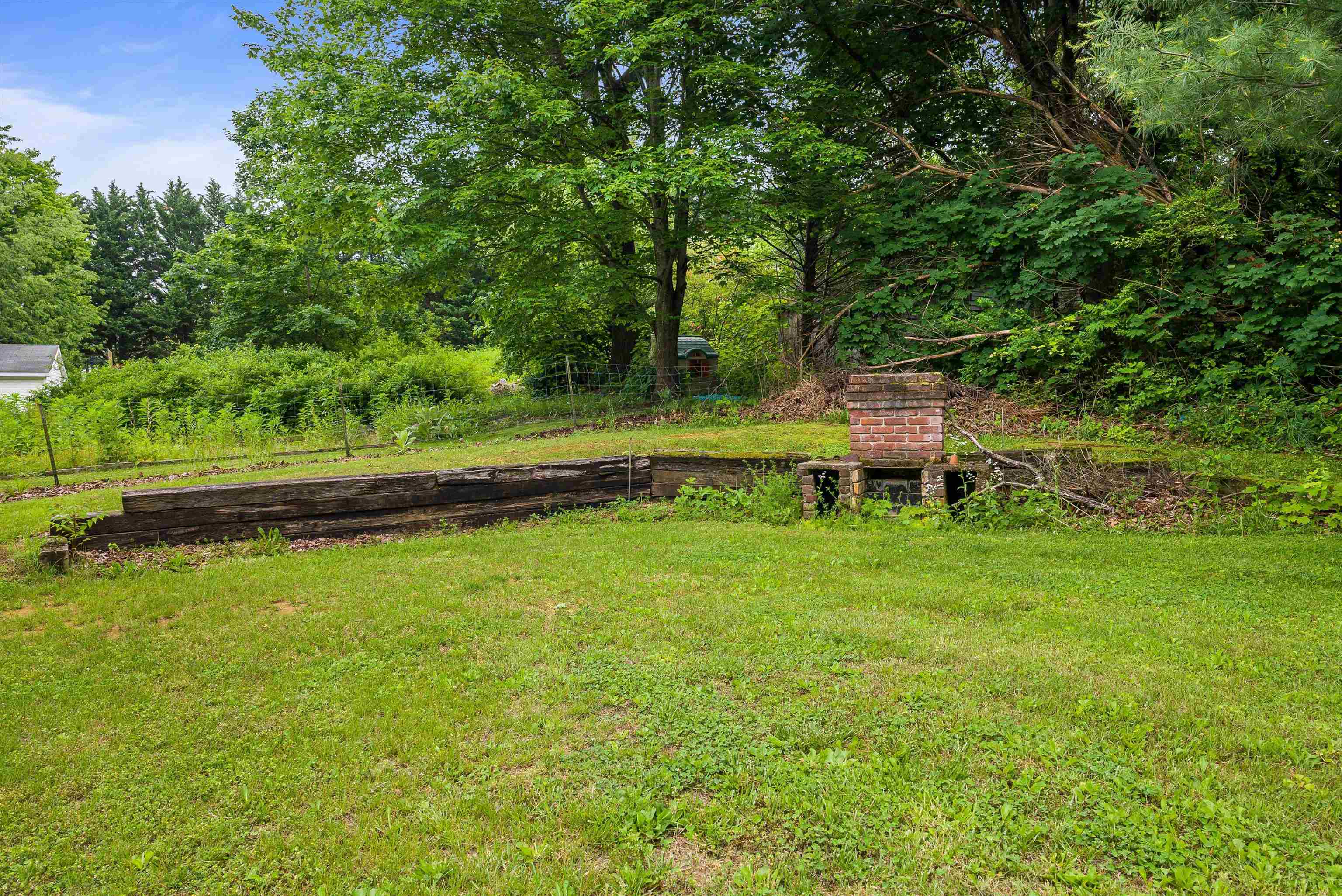 2156 Lyndhurst Road Waynesboro, VA 22980 - Photo 32 of 35 a backyard of a house with a yard and outdoor seating