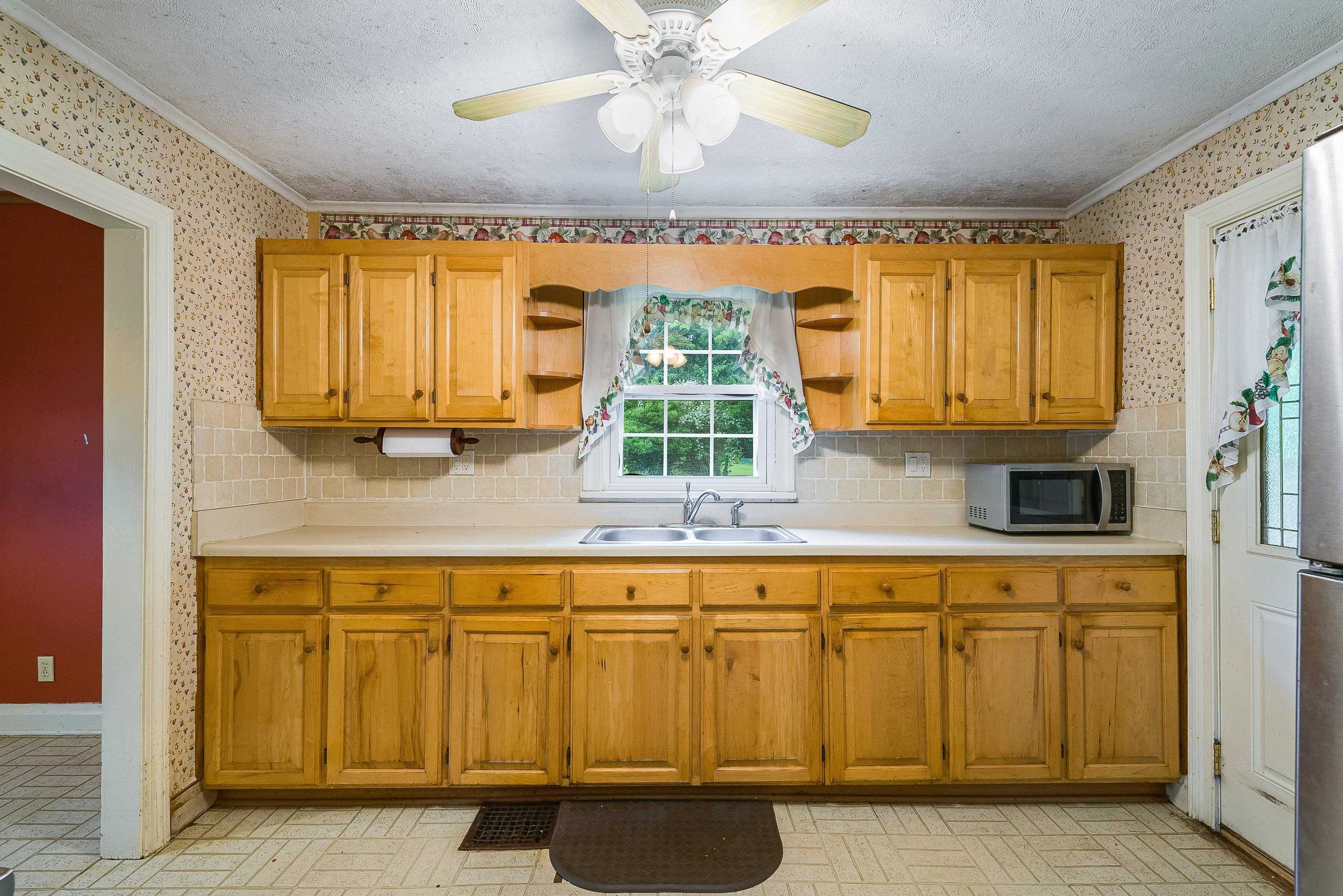 2156 Lyndhurst Road Waynesboro, VA 22980 - Photo 10 of 35 a kitchen with a sink cabinets and window
