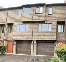 78 Towne House Road, Unit 78 Hamden, CT 06514 - Photo 1 of 1 a view of a house with large windows
