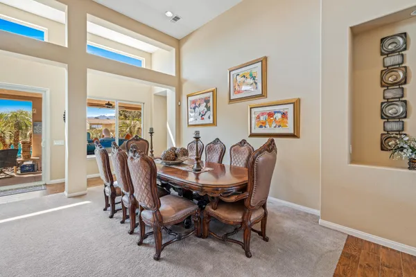 a view of a dining room with furniture