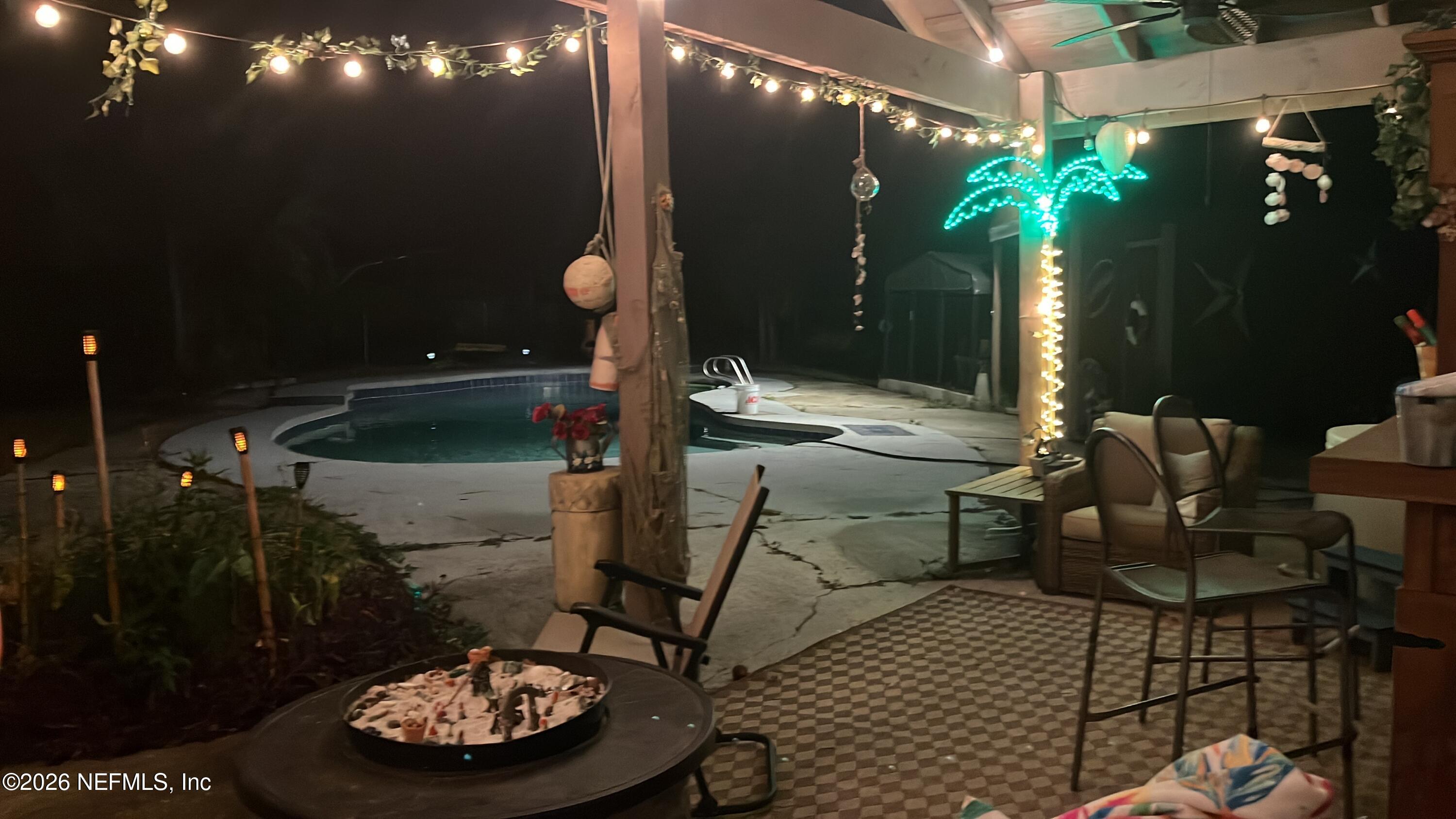 1131 Cactus Cut Road Middleburg, FL 32068 - Photo 23 of 25 Pool Area Night Time