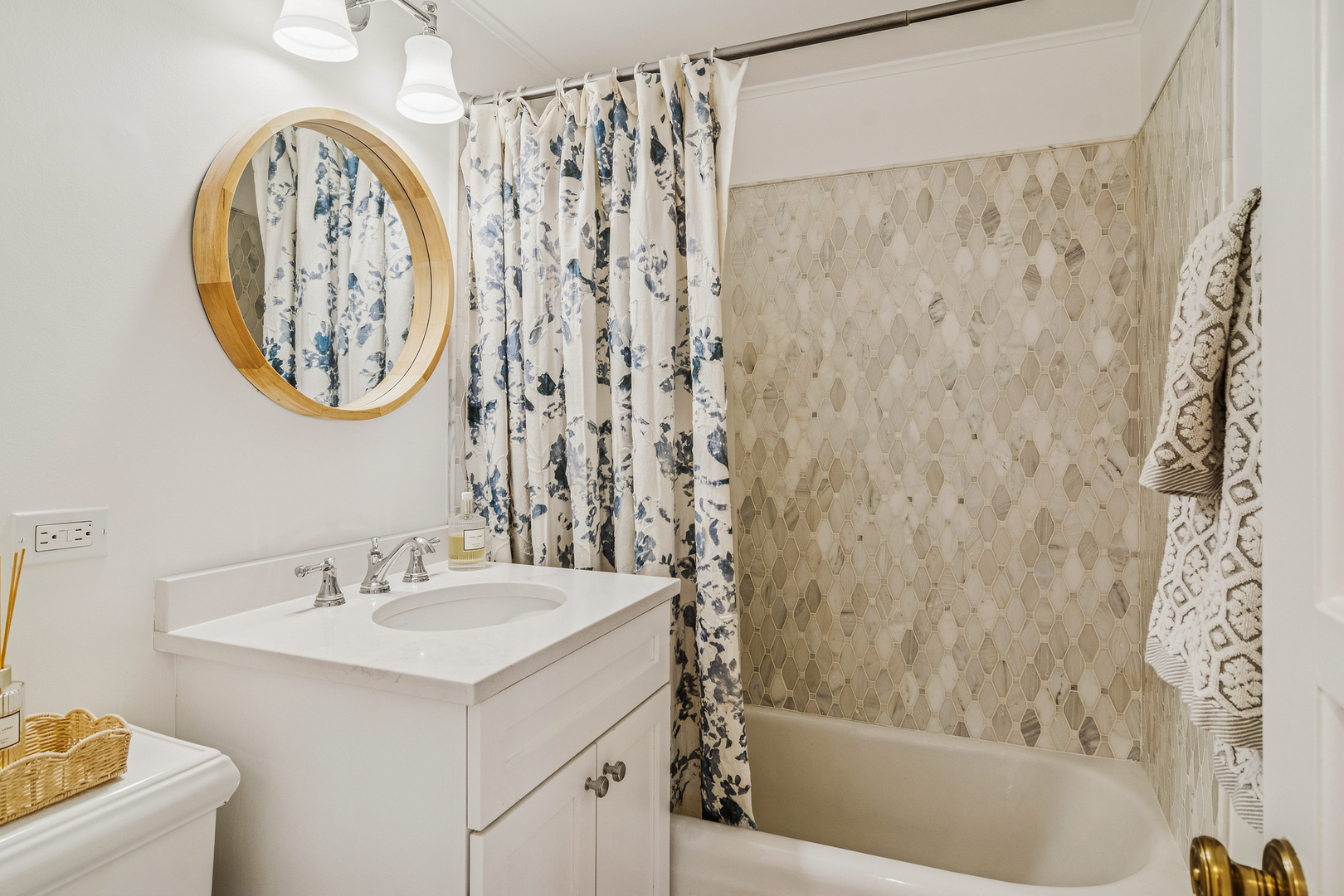 240 Elm Road Barrington, IL 60010 - Photo 22 of 56 a bathroom with a sink and a mirror
