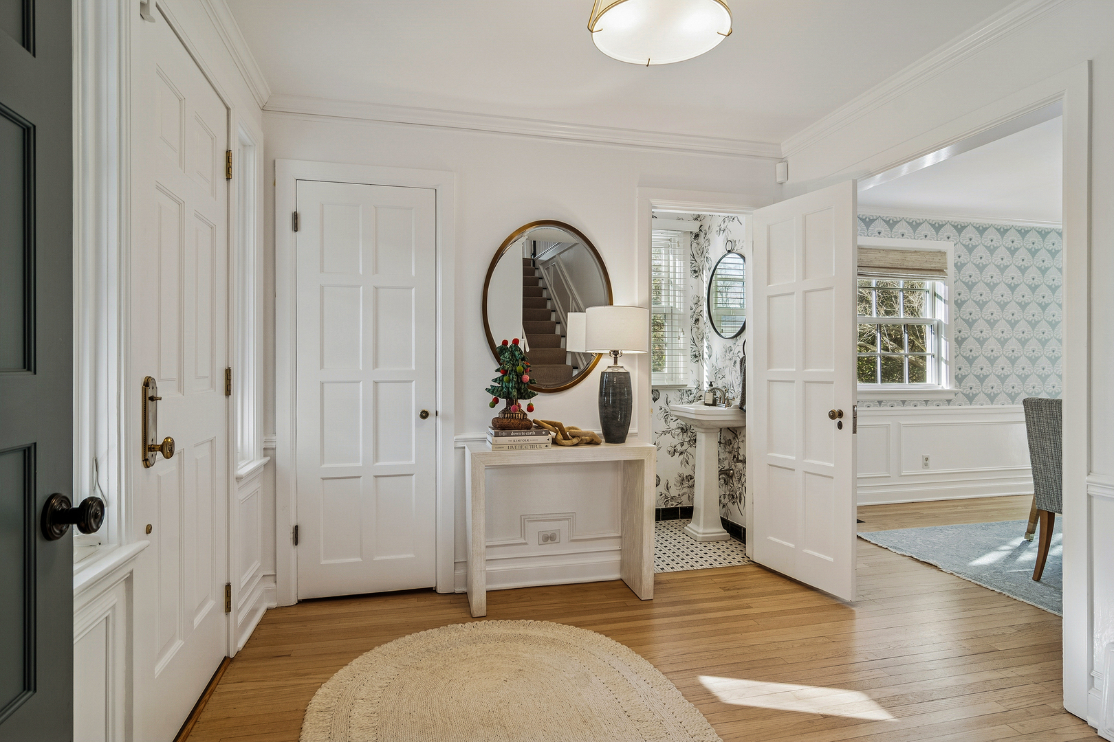 240 Elm Road Barrington, IL 60010 - Photo 4 of 56 a view of a livingroom with wooden floor and furniture