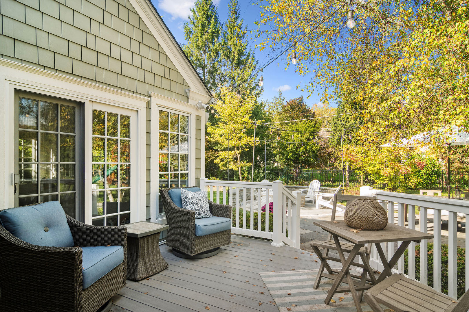 240 Elm Road Barrington, IL 60010 - Photo 46 of 56 a view of a deck with couches wooden floor and fence