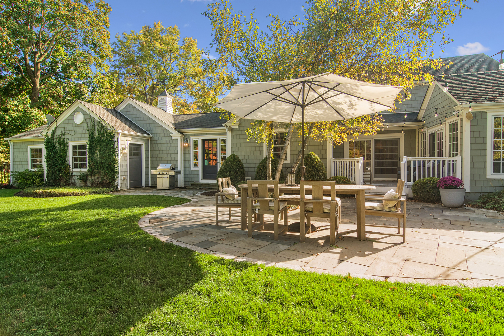 240 Elm Road Barrington, IL 60010 - Photo 48 of 56 a view of a house with backyard and sitting area