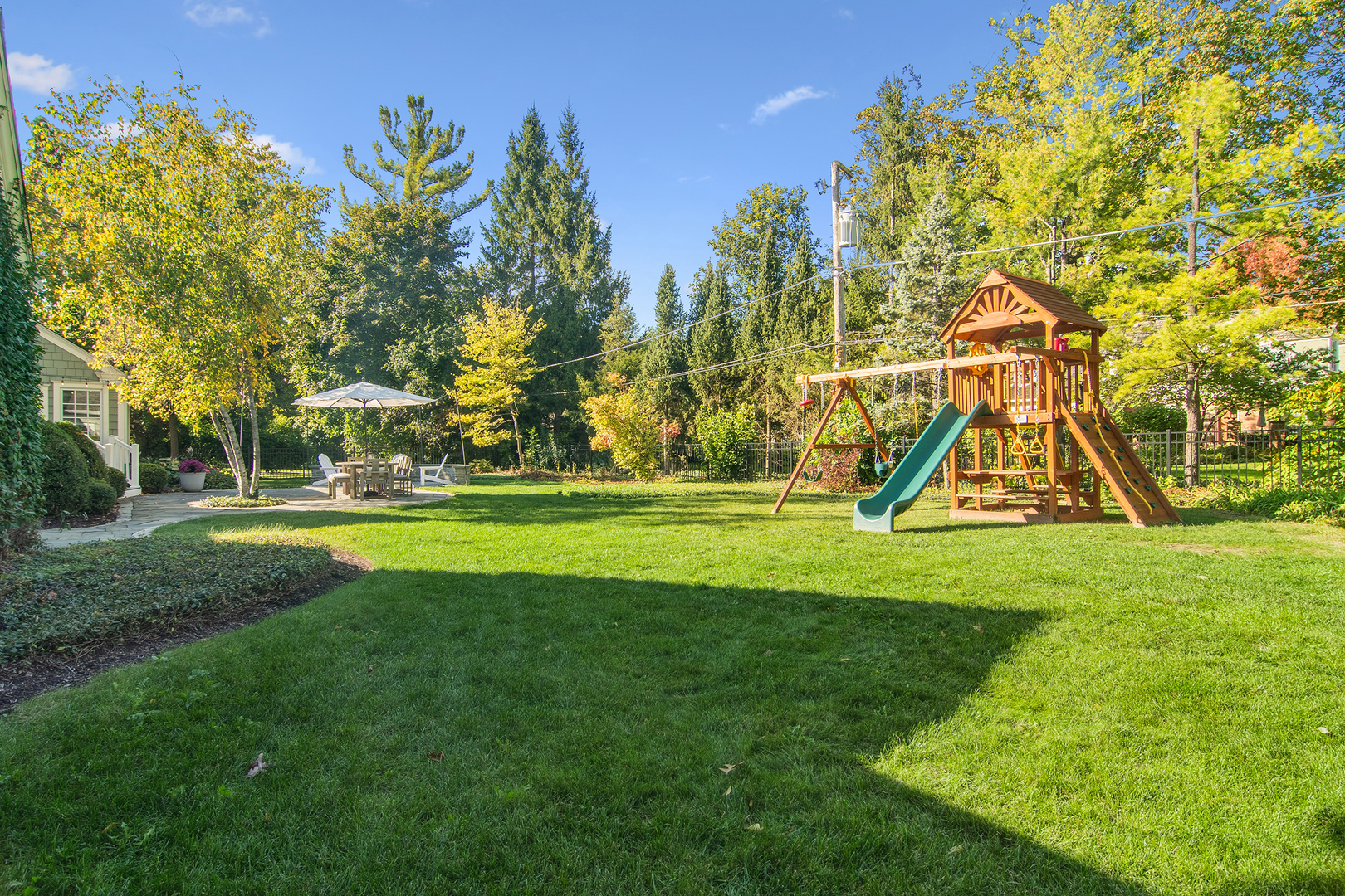 240 Elm Road Barrington, IL 60010 - Photo 55 of 56 a view of swimming pool with a big yard and potted plants and large trees