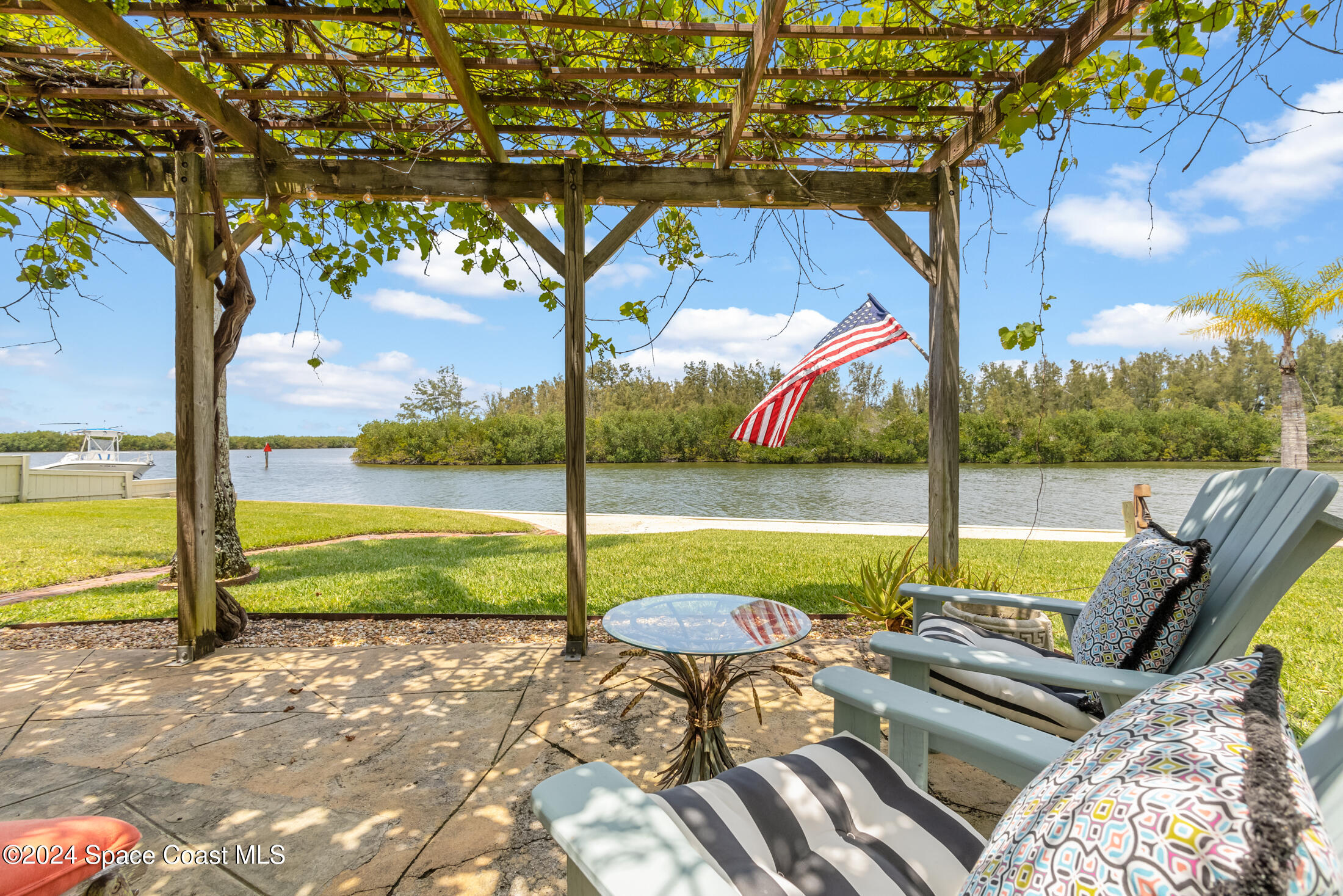 2051 Bali Road Cocoa Beach, FL 32931 - Photo 1 of 33 a view of swimming pool with lounge chairs