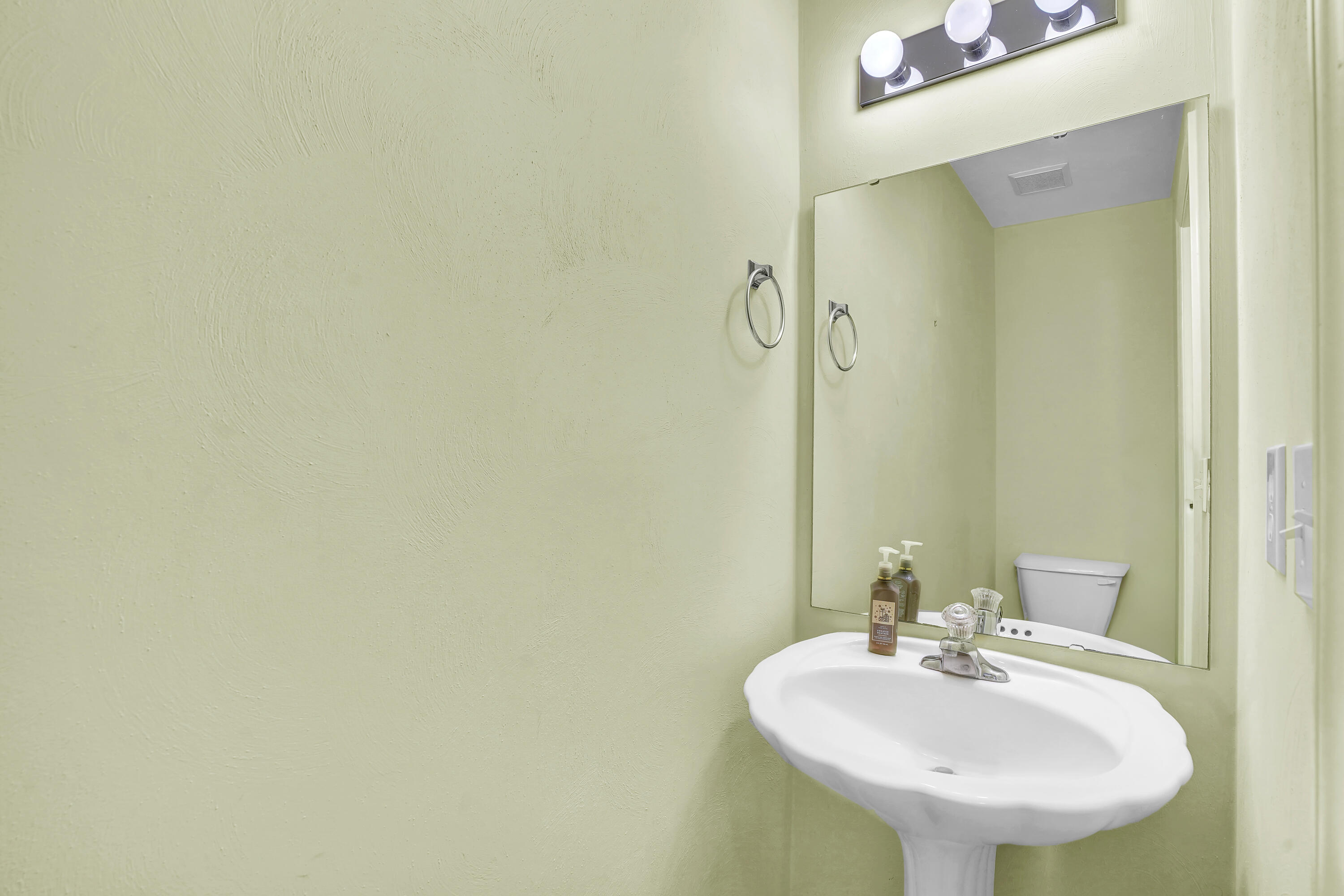 7607 Peebles Lane Roanoke, VA 24018 - Photo 18 of 57 a bathroom with a sink and a mirror