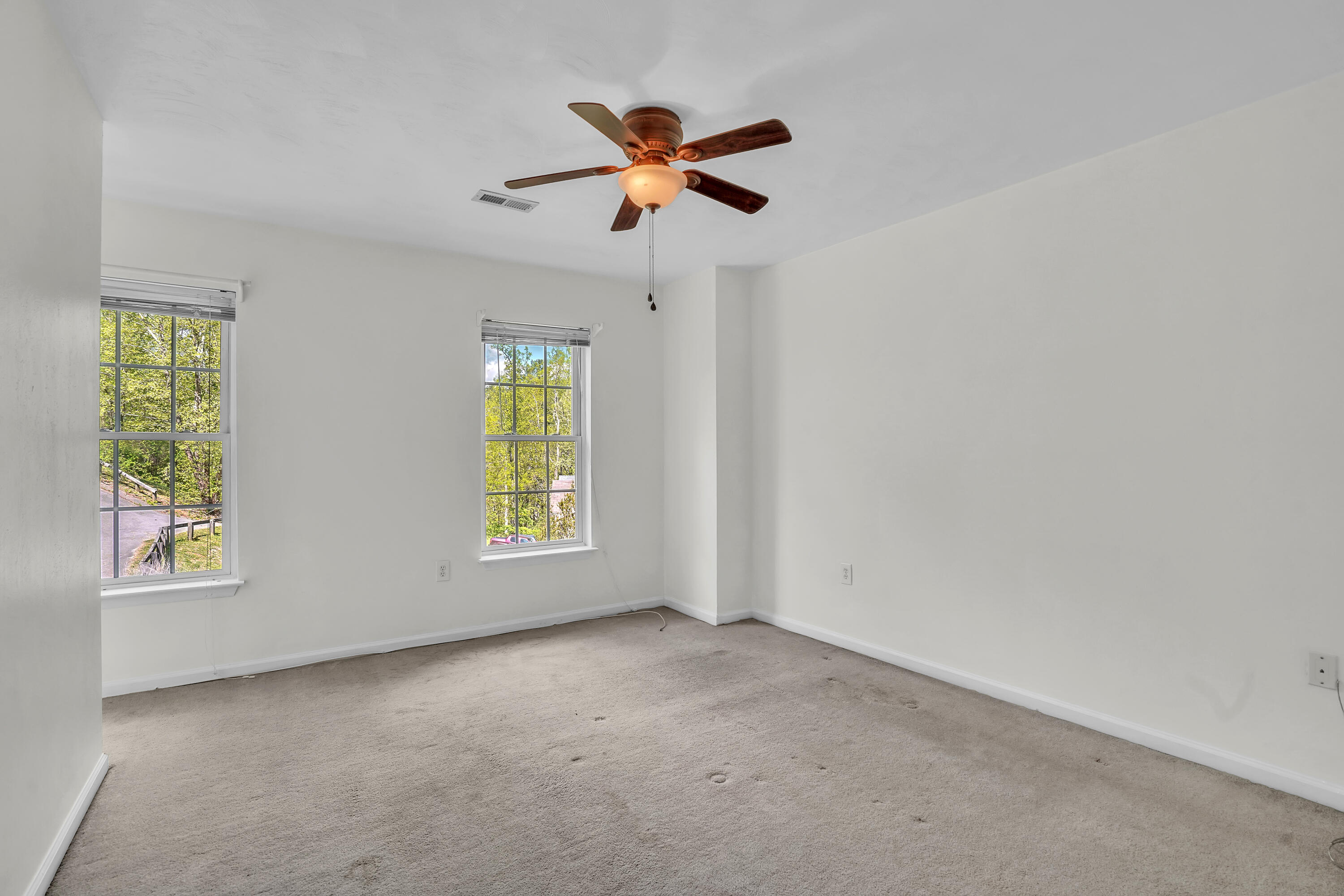 7607 Peebles Lane Roanoke, VA 24018 - Photo 20 of 57 a view of room with window and ceiling fan