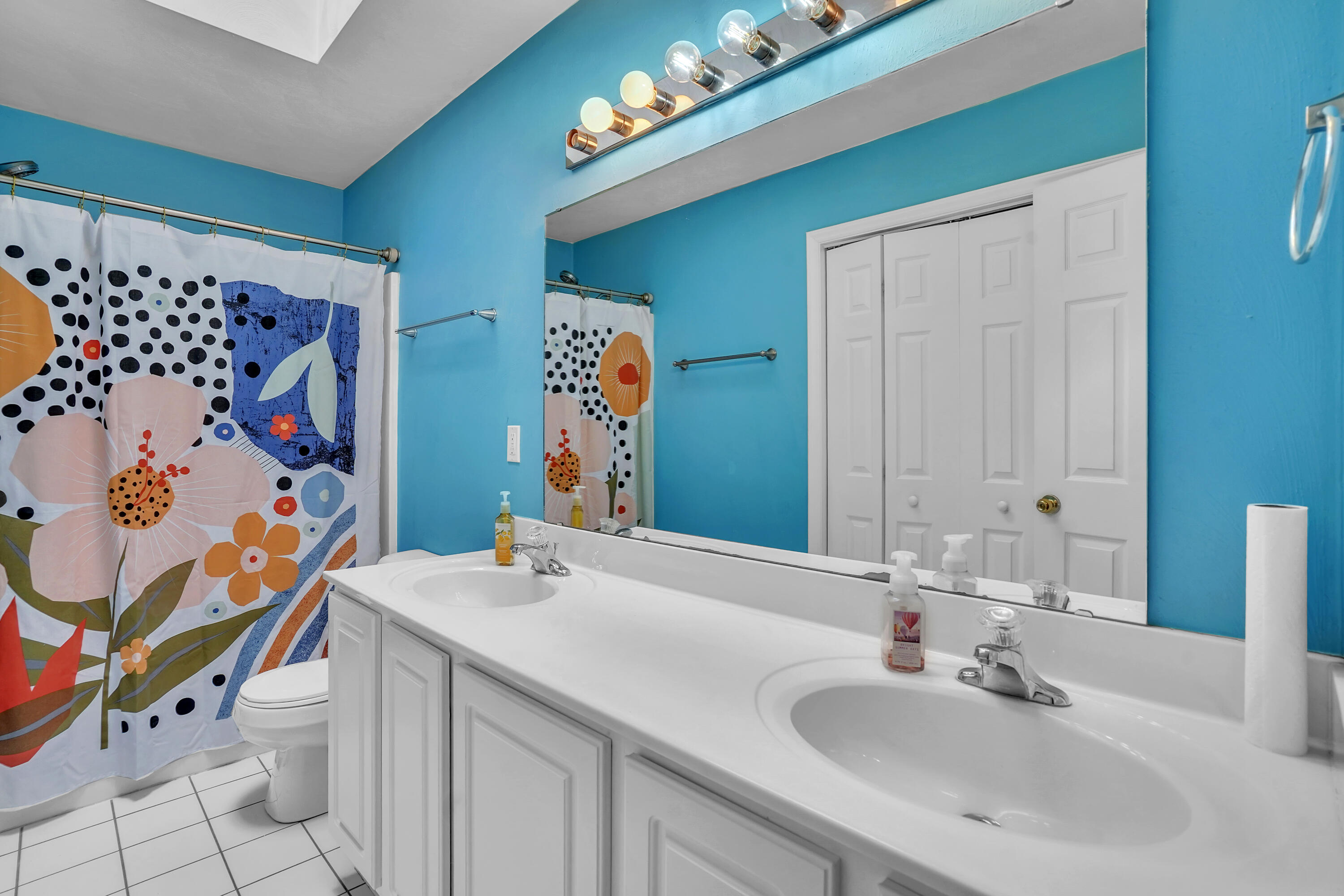 7607 Peebles Lane Roanoke, VA 24018 - Photo 29 of 57 a bathroom with a sink mirror and vanity