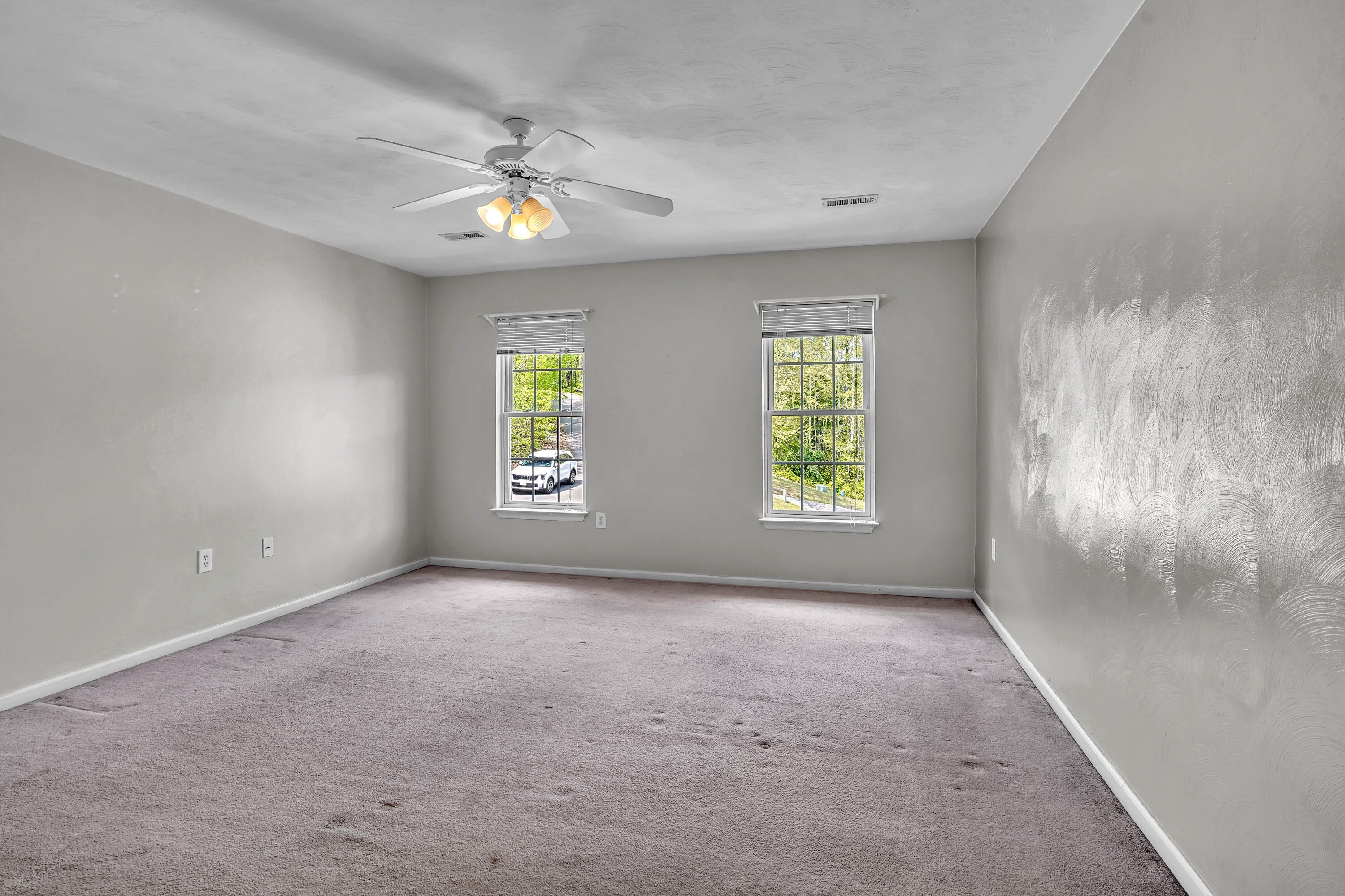 7607 Peebles Lane Roanoke, VA 24018 - Photo 33 of 57 a view of an empty room with window and chandelier fan