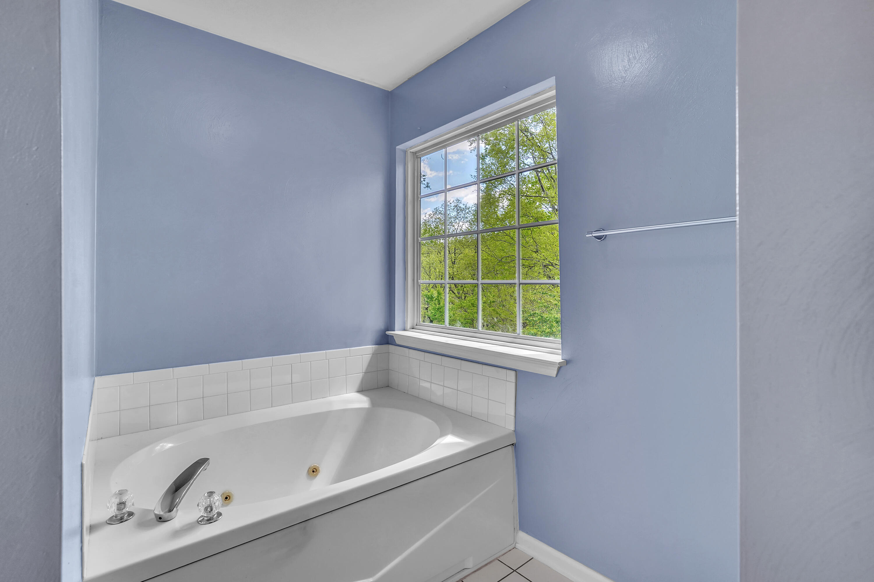 7607 Peebles Lane Roanoke, VA 24018 - Photo 36 of 57 a white bath tub sitting next to a window