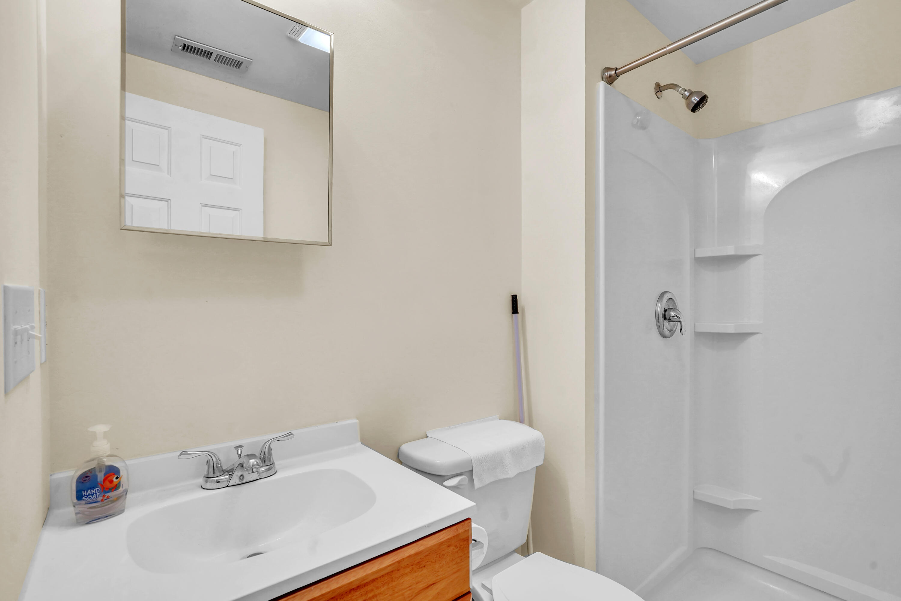 7607 Peebles Lane Roanoke, VA 24018 - Photo 40 of 57 a bathroom with a sink a toilet and shower