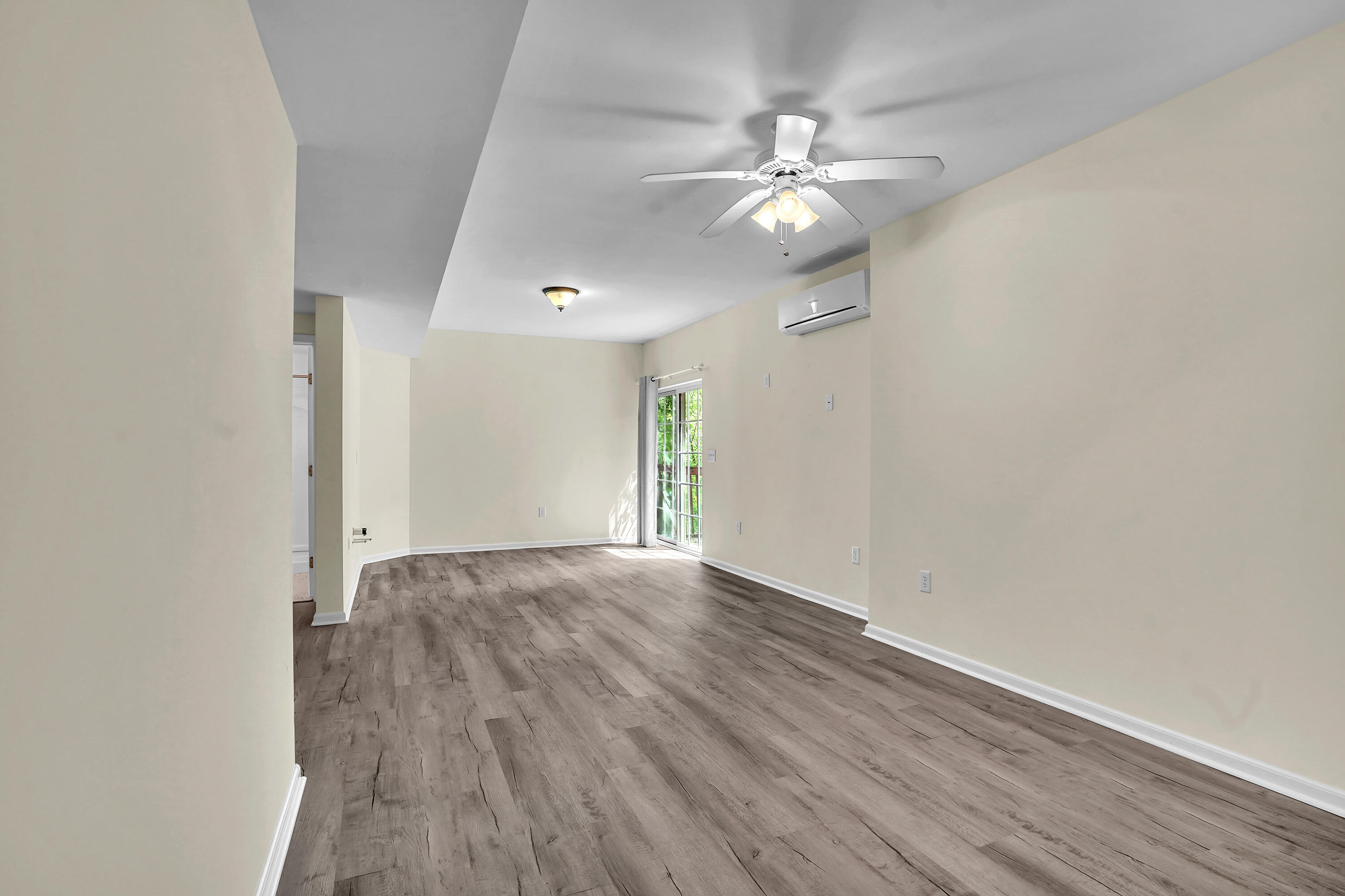7607 Peebles Lane Roanoke, VA 24018 - Photo 43 of 57 wooden floor in an empty room with a window