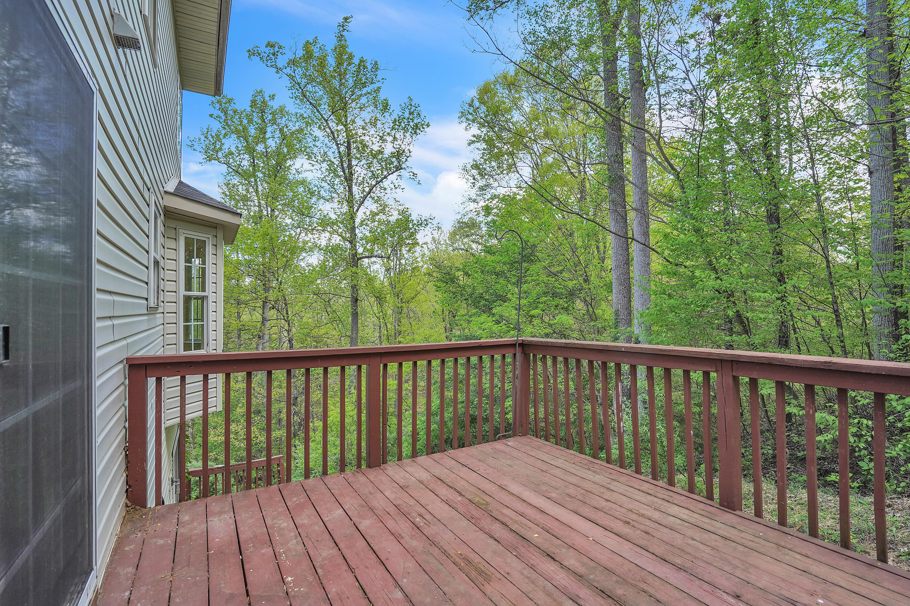 7607 Peebles Lane Roanoke, VA 24018 - Photo 48 of 57 a balcony with wooden floor and fence
