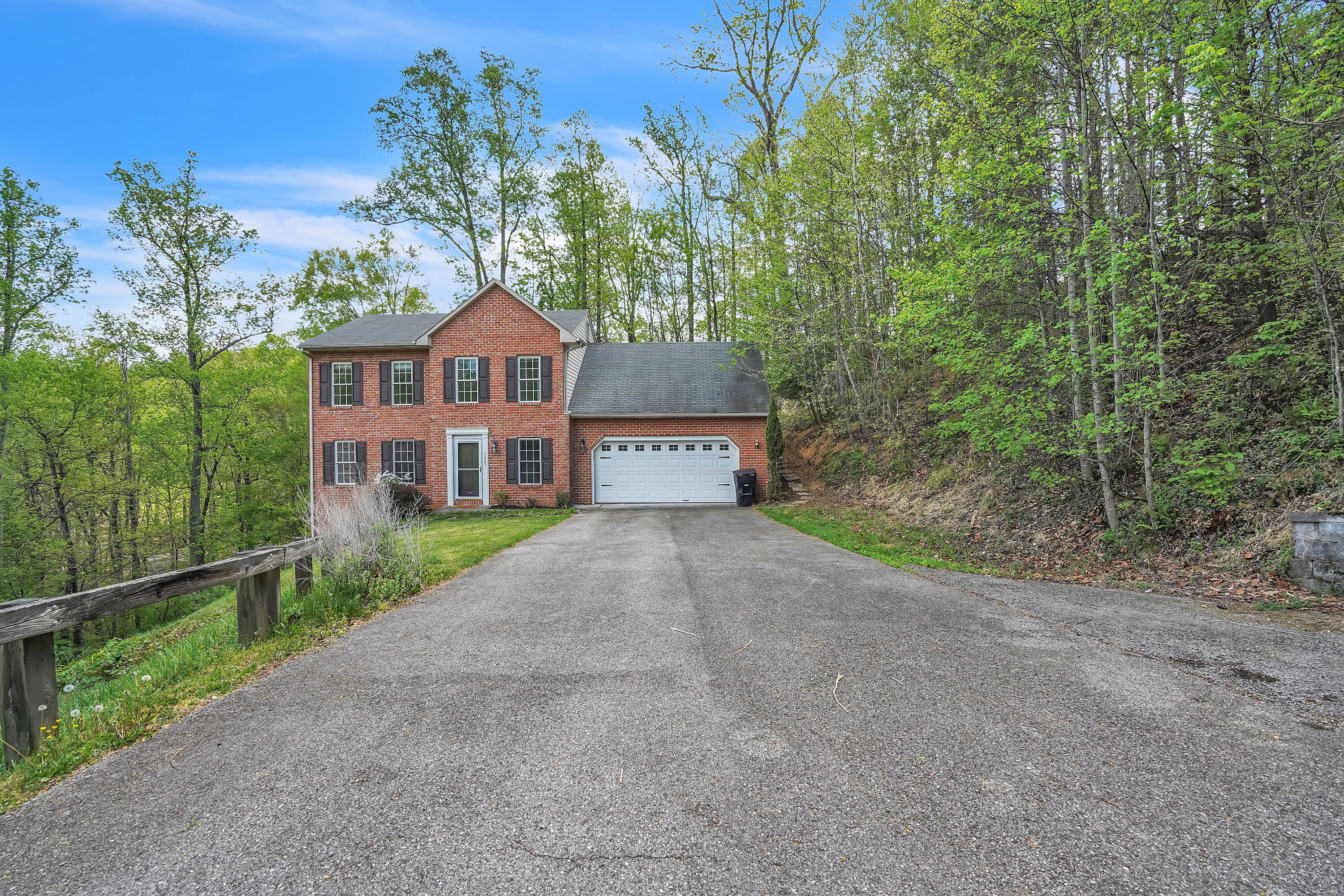7607 Peebles Lane Roanoke, VA 24018 - Photo 53 of 57 a view of a house with a yard and large tree