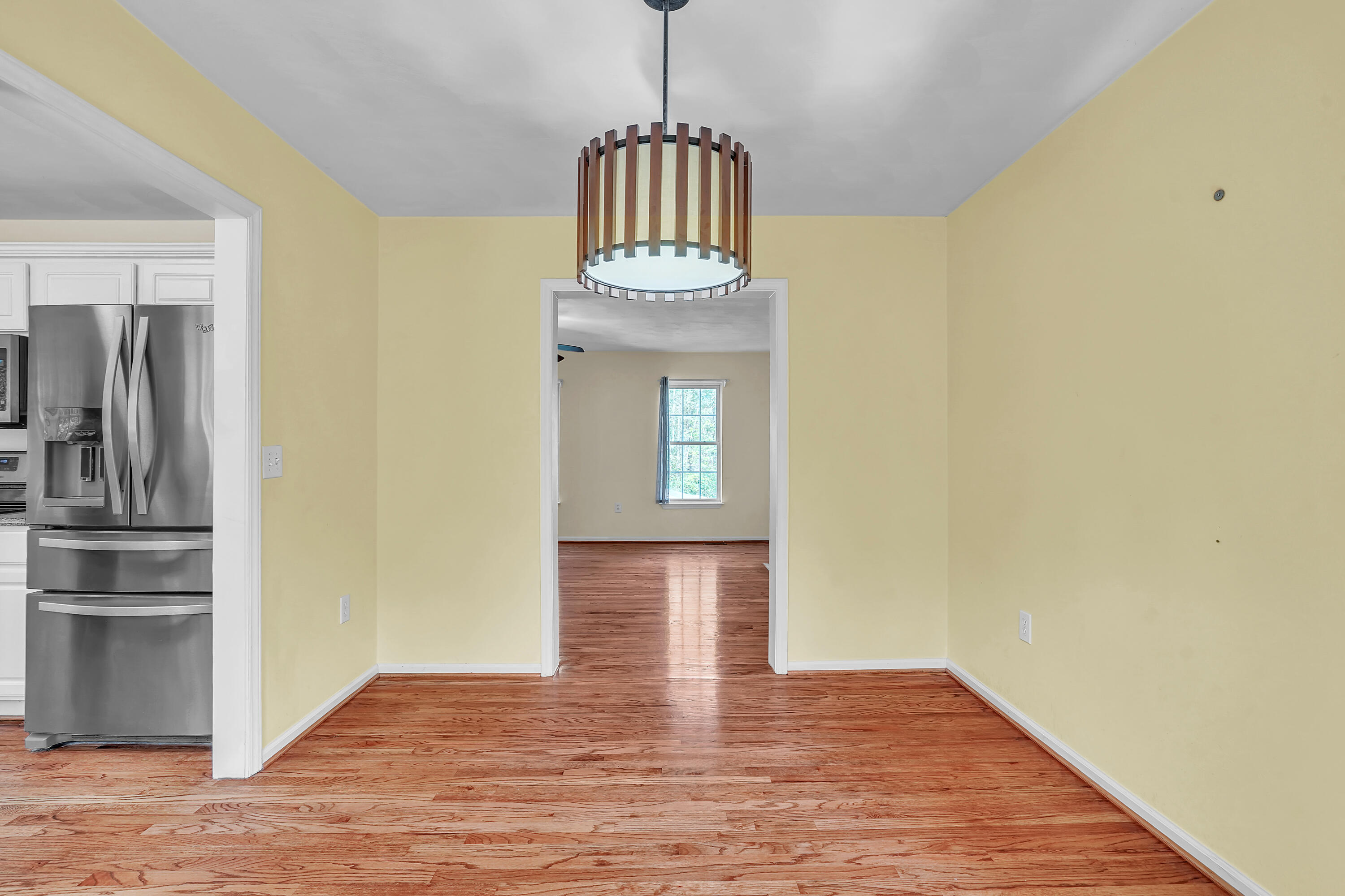 7607 Peebles Lane Roanoke, VA 24018 - Photo 10 of 57 a view of a hallway with wooden floor and staircase