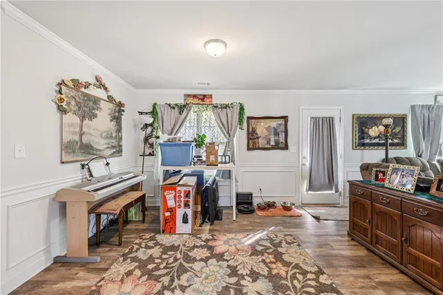 a living room with lots of furniture and window