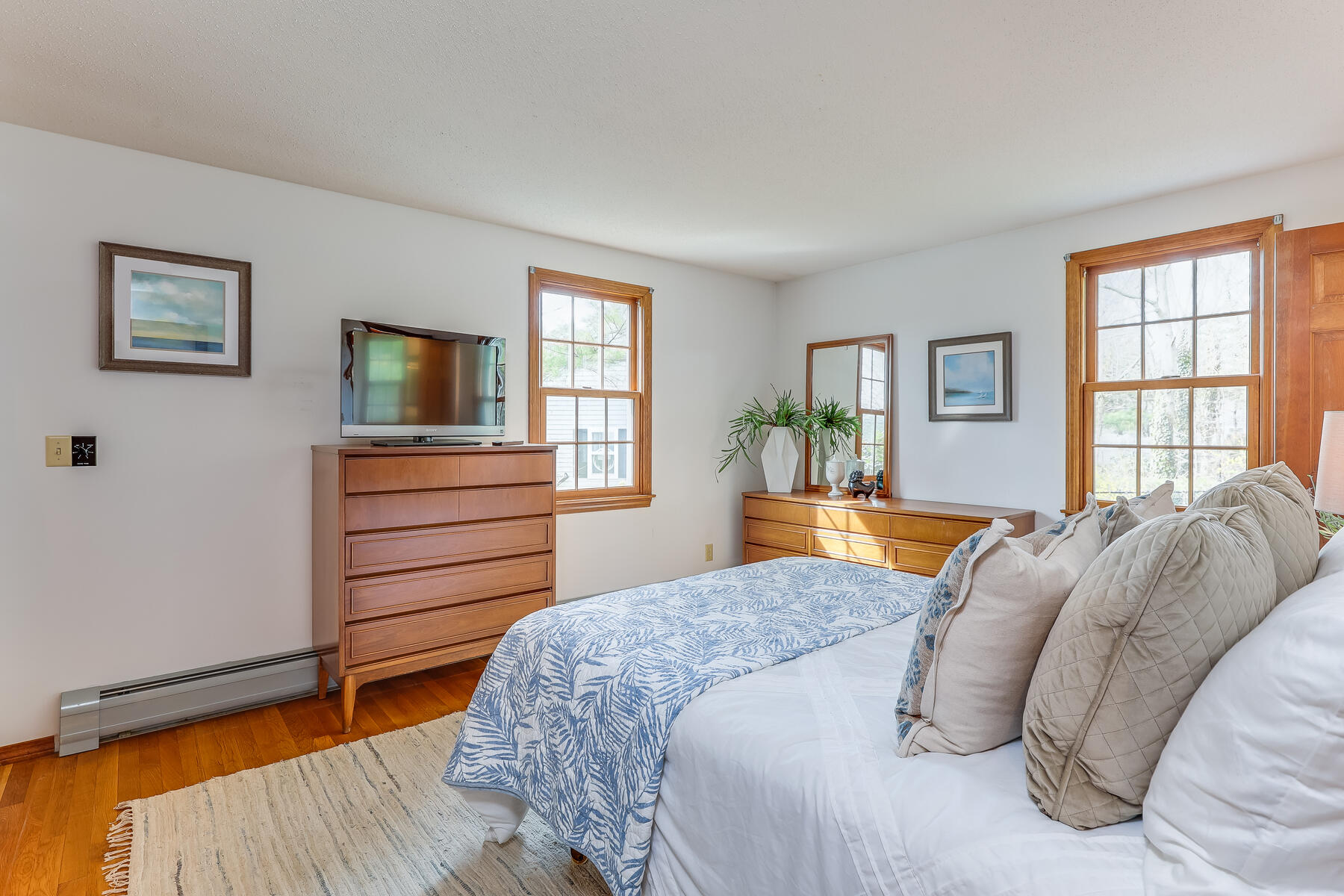 17 Eben Smith Road Centerville, MA 02632 - Photo 23 of 30 a bedroom with a bed and a flat screen tv