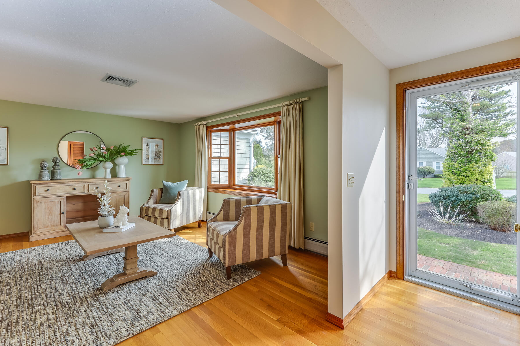 17 Eben Smith Road Centerville, MA 02632 - Photo 6 of 30 a living room with furniture and a floor to ceiling window