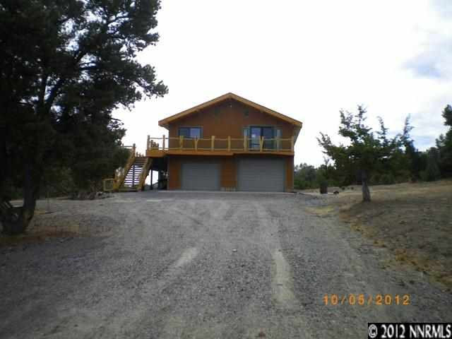 1780 Combination Road Reno, NV 89521 - Photo 1 of 1 a house with trees in the background
