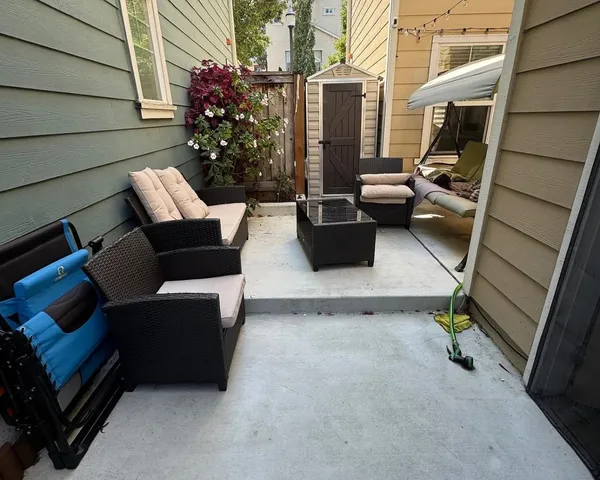 a view of a backyard of the house